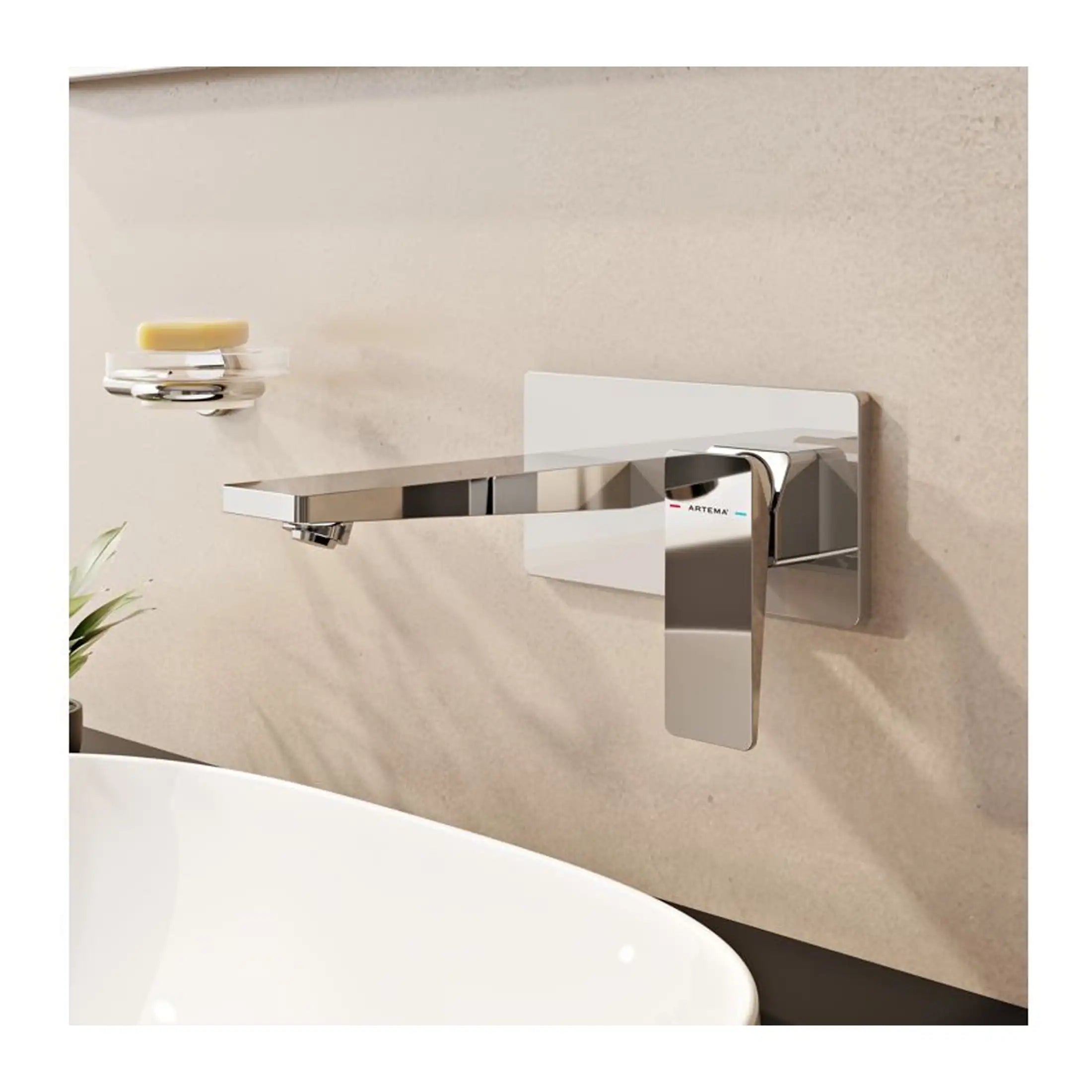 Modern chrome bathroom tap with a sleek, minimalist design mounted on a beige wall, ideal for contemporary stylish bathrooms and washbasins.