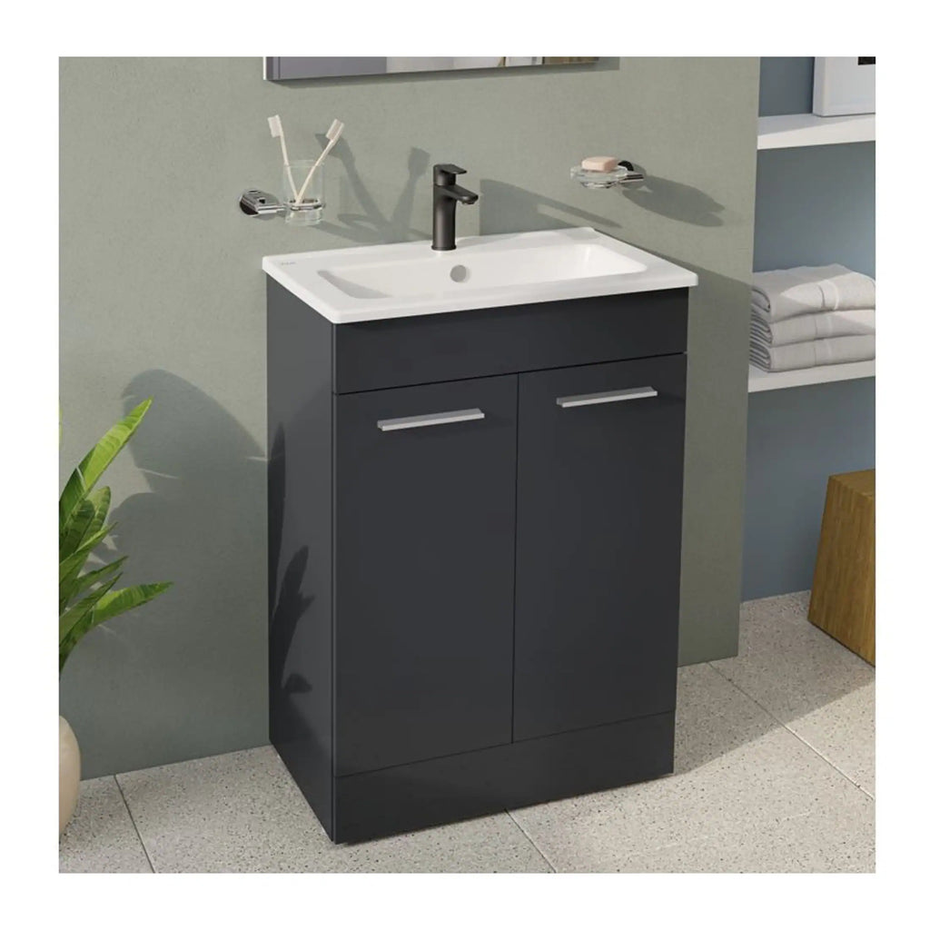 Contemporary bathroom vanity unit with black finish, integrated sink, and modern black faucet, perfect for sleek and stylish bathroom storage solutions.