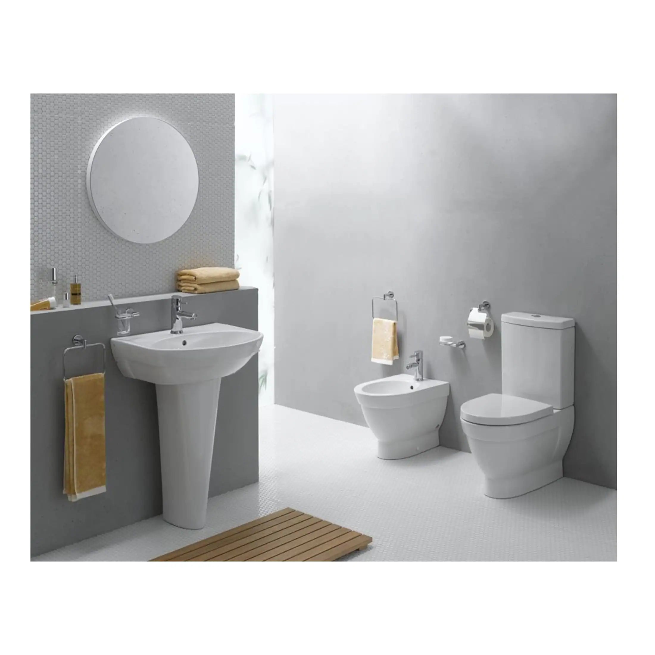 Modern minimalist bathroom with white sanitary ware including toilet, bidet, and sink, featuring sleek fixtures and neutral grey walls for a clean, contemporary look.