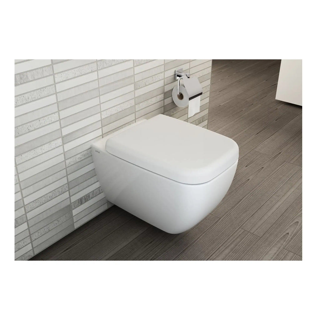 Sleek white wall-mounted toilet with modern design, positioned next to textured tiled wall and wooden flooring, ideal for contemporary bathroom renovations.