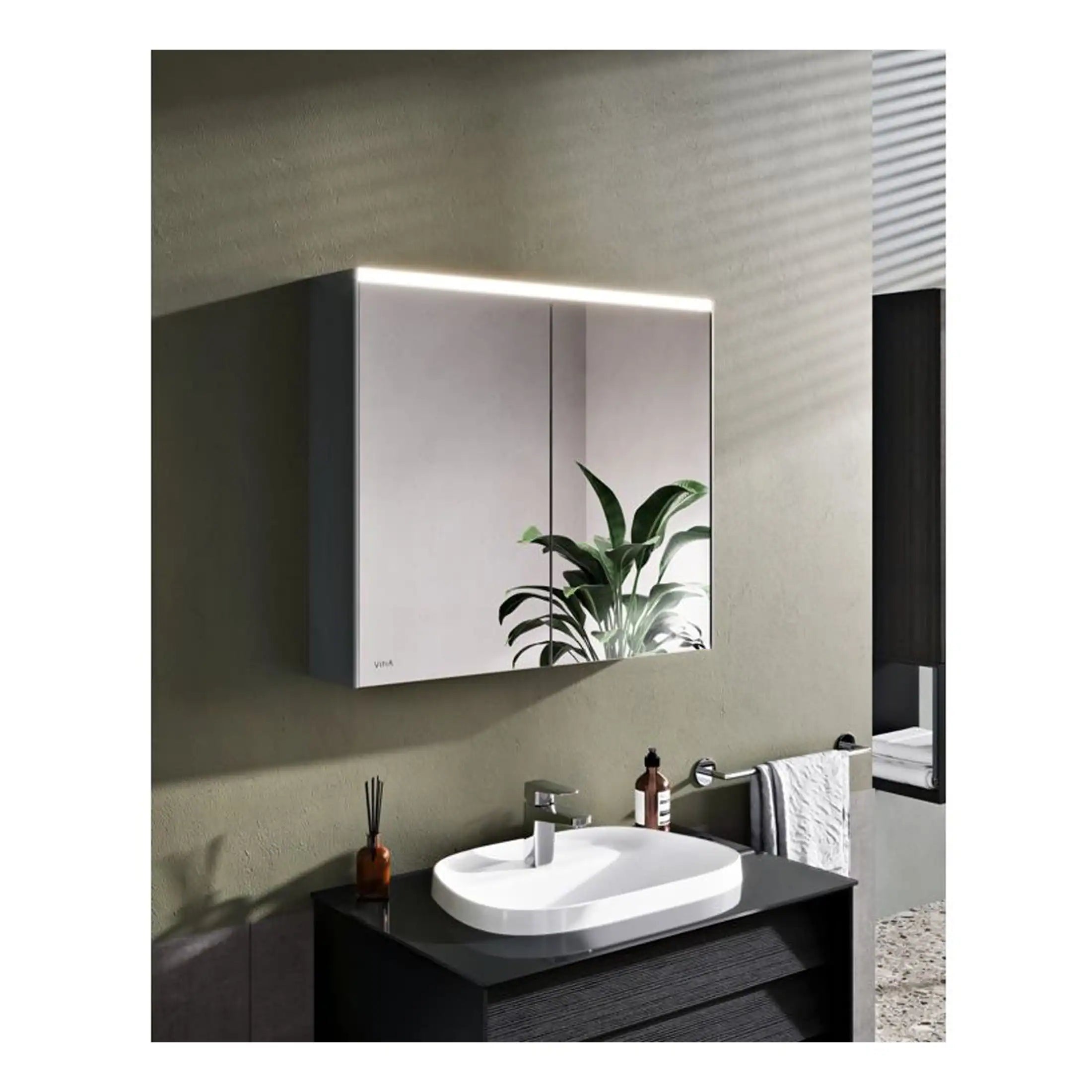 Sleek modern bathroom mirror cabinet with integrated LED lighting, designed for stylish and functional bathroom storage and decor.