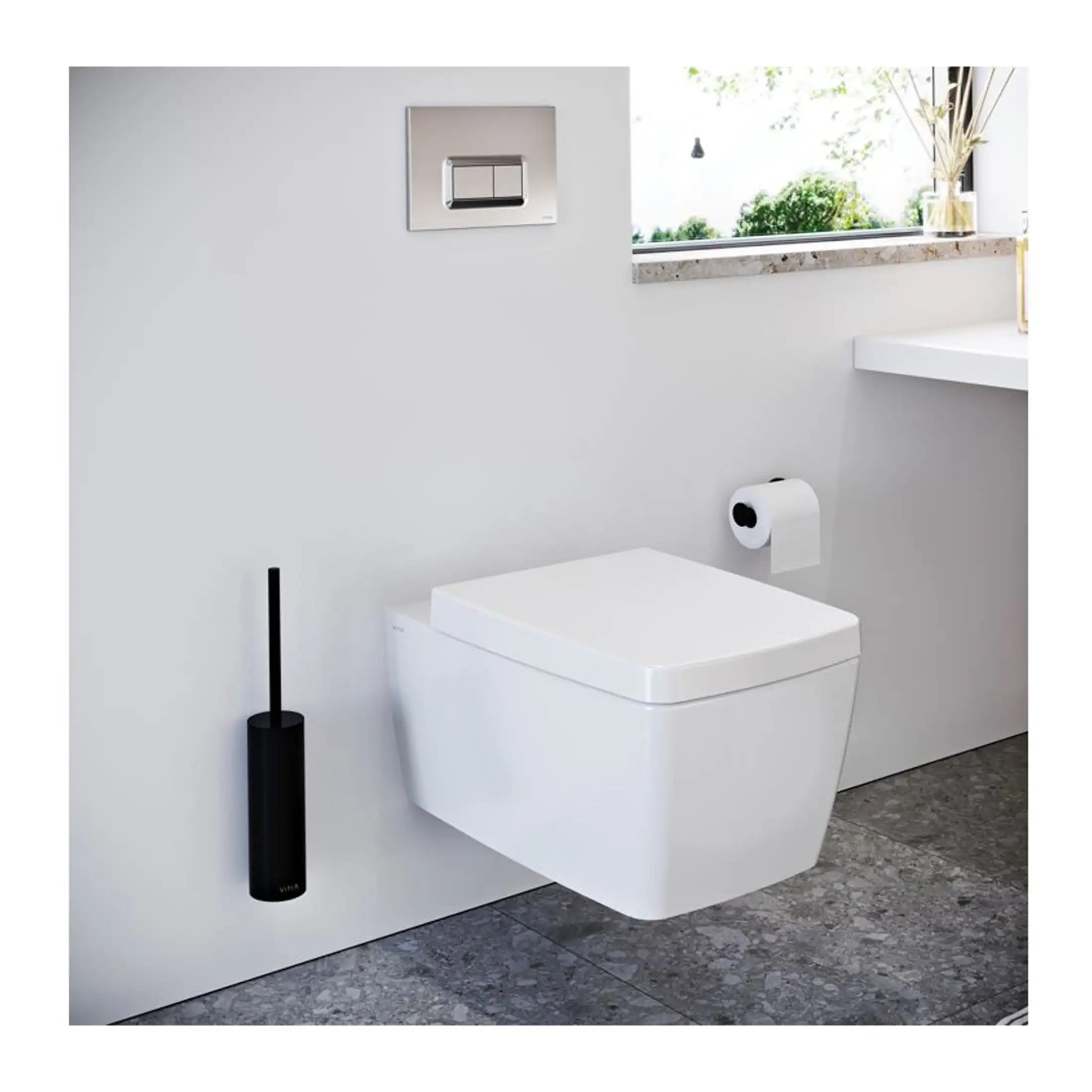 Sleek modern wall-mounted toilet in a contemporary bathroom with minimalist design and clean white fixtures. Natural light from the window highlights the stylish and functional bathroom setup.
