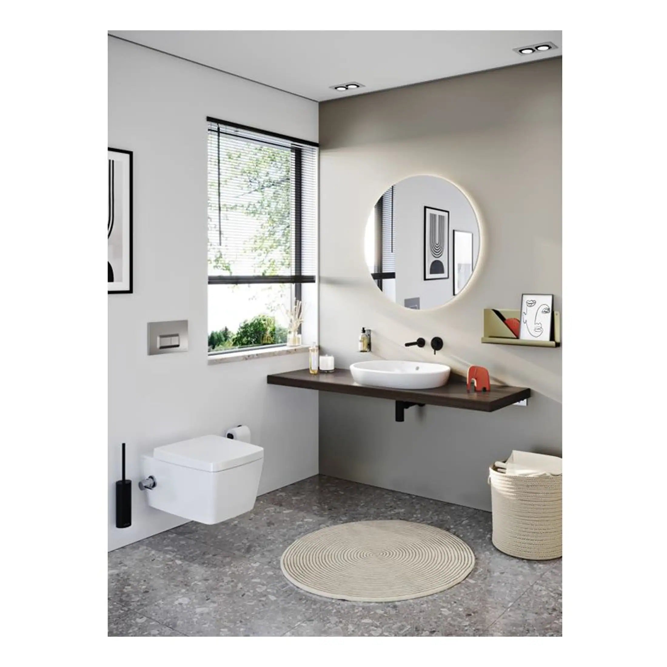 Modern minimalist bathroom with wall-mounted toilet, round mirror, floating vanity with vessel sink, and large window; stylish and functional bathroom design.
