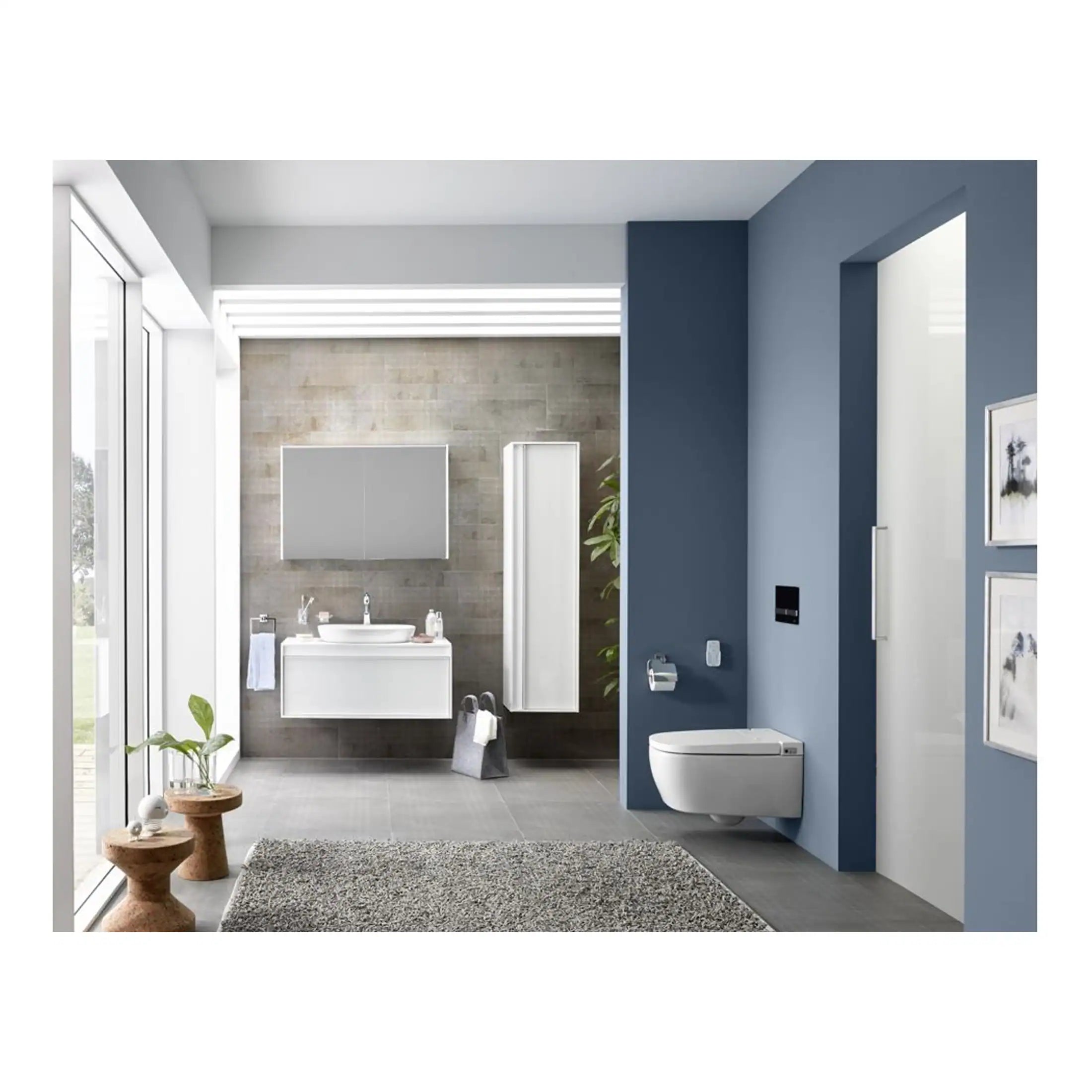 Modern bathroom with contemporary white fixtures, blue wall, and natural light, showcasing sleek design, stylish decor, and efficient bathroom fittings for a luxurious and functional space.