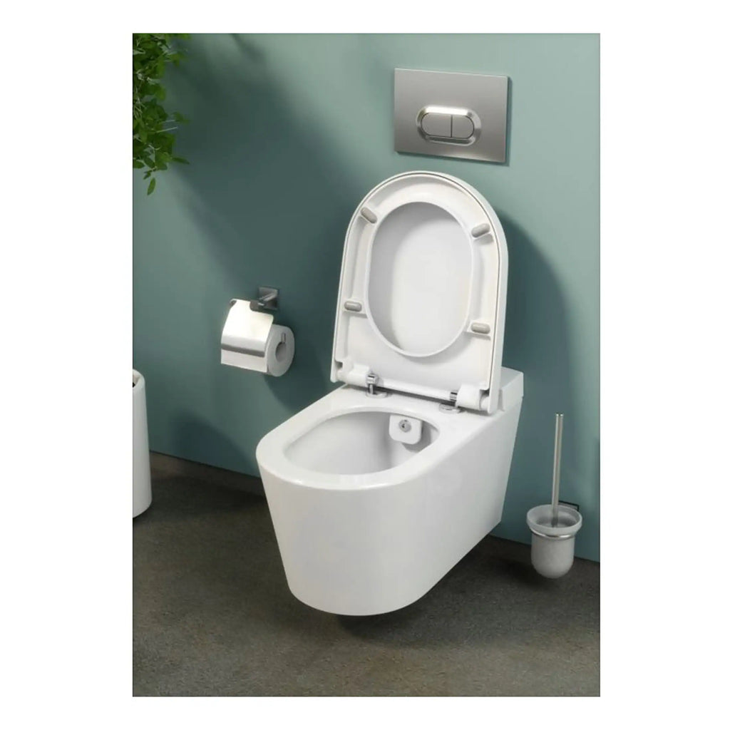 Toilet with wall-mounted flush, modern sleek design, close-up view of white ceramic toilet and toilet paper holder in a contemporary bathroom.