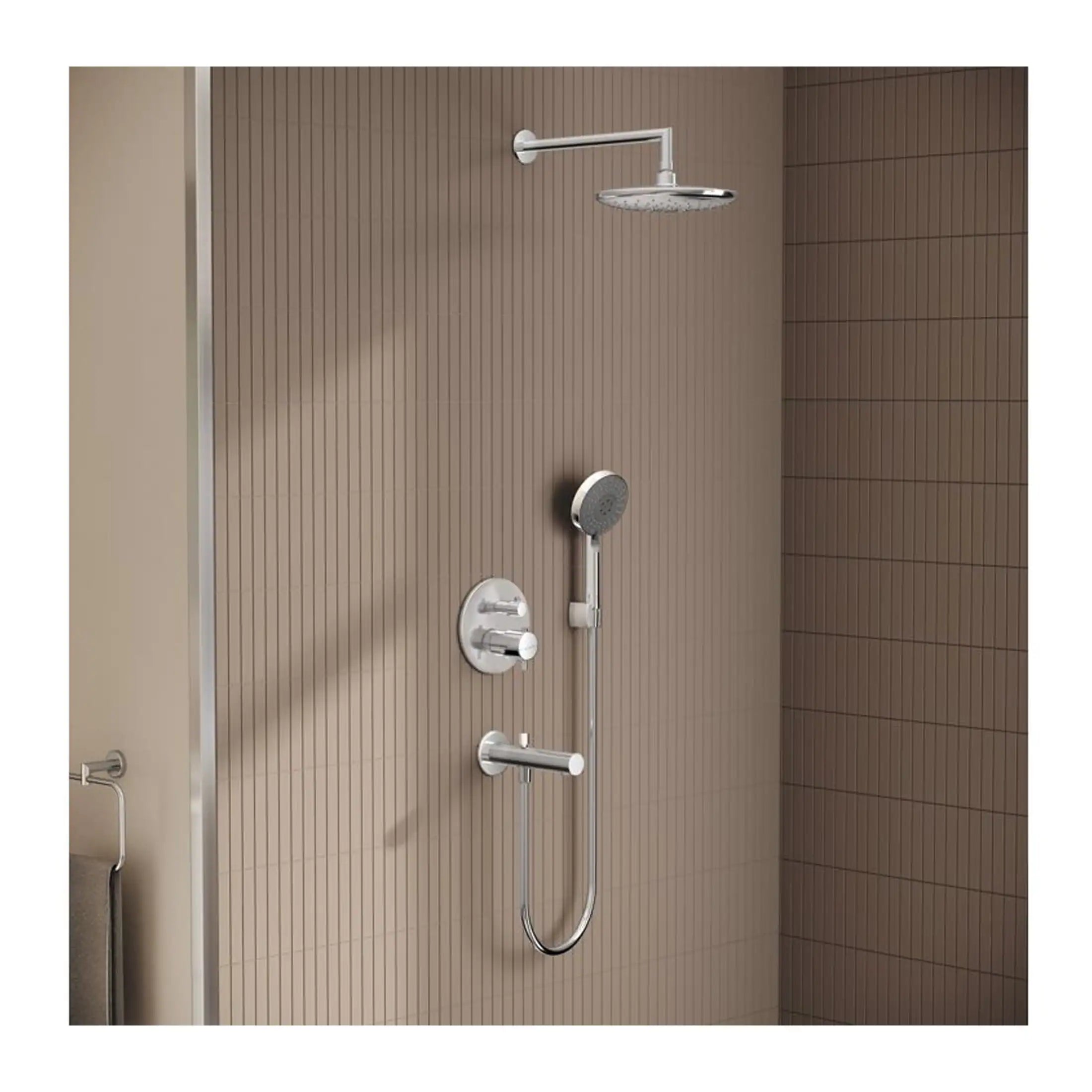 Shower system with overhead shower and handheld attachment in a modern bathroom with brown tiled wall.