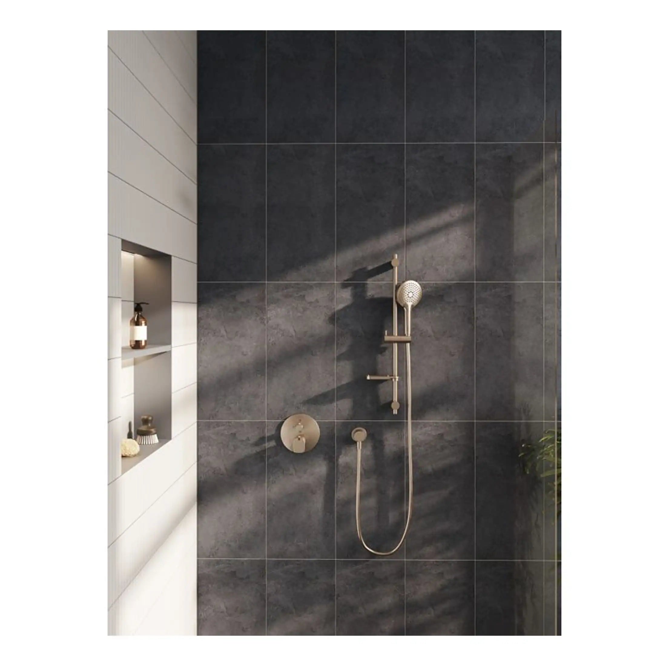 Sleek modern shower with matte brass fixtures and dark stone tiled wall in a contemporary Bubly Bathrooms design. Perfect for a stylish, luxurious bathroom update.