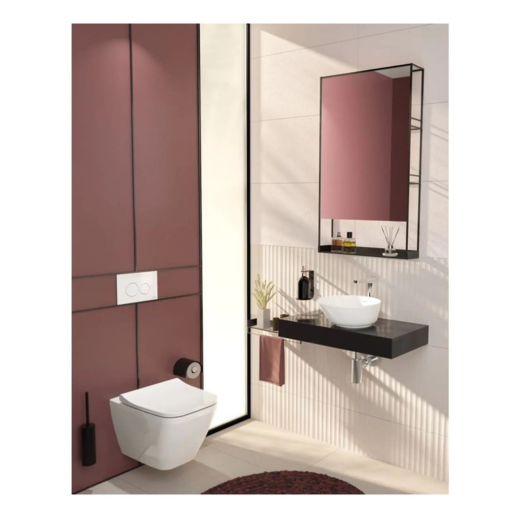Modern bathroom with wall-mounted toilet, black floating vanity with vessel sink, large pink accent wall, and stylish mirror cabinet, showcasing contemporary bathroom design ideas.