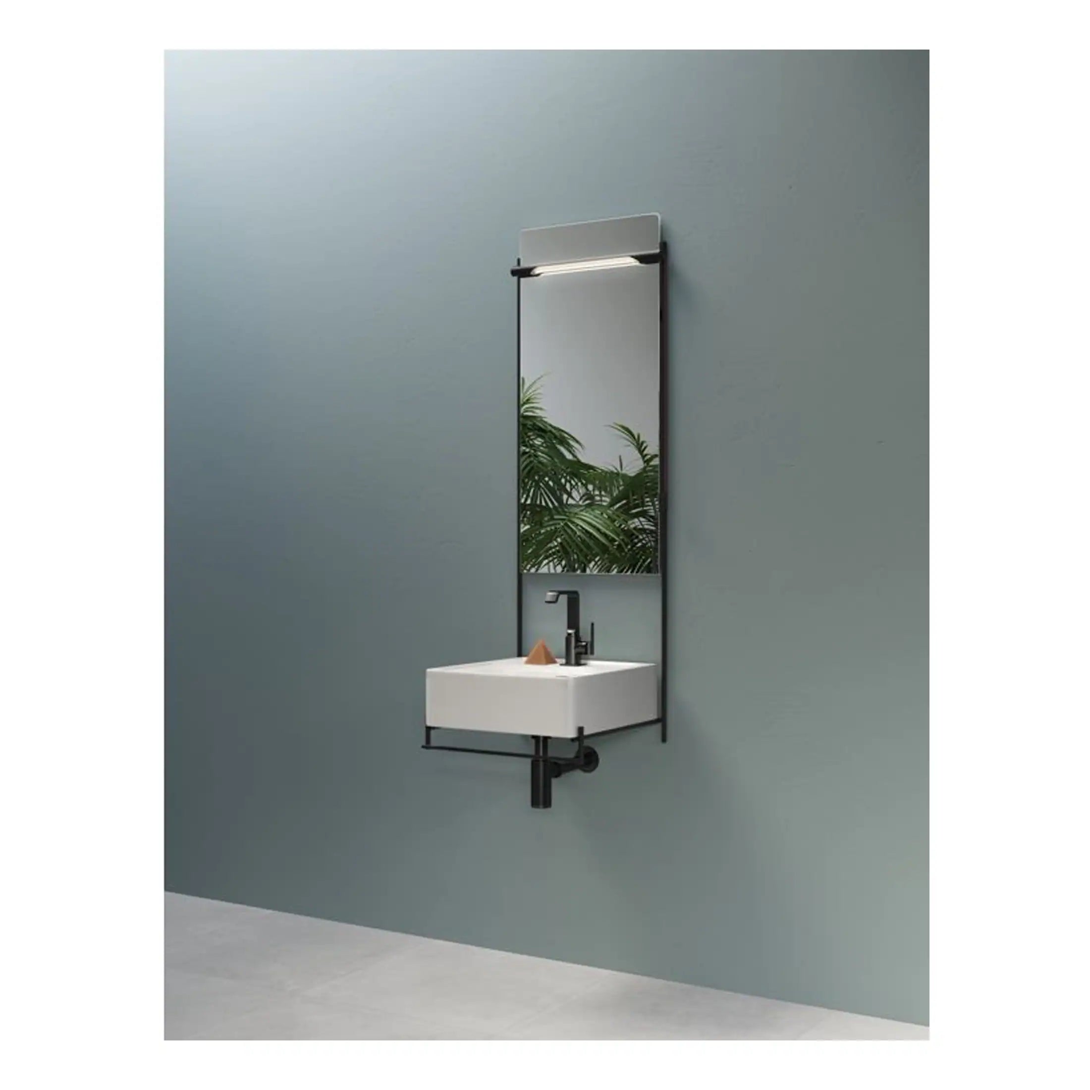 Modern wall-mounted bathroom sink with a tall mirror and sleek black frame, ideal for contemporary Bubly bathrooms focusing on minimalist design and space efficiency.