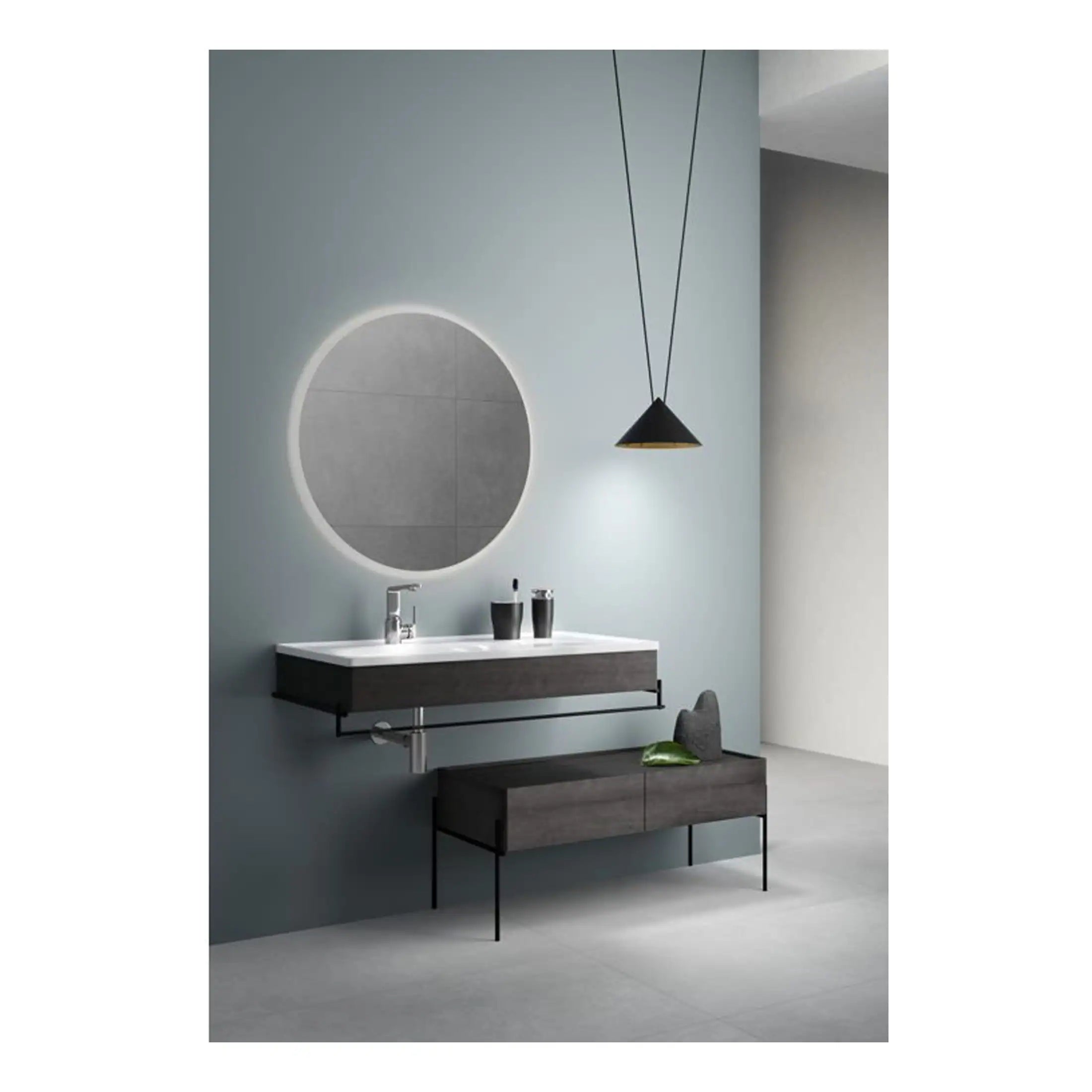 Contemporary bathroom vanity unit with integrated sink, dark wood finish, circular mirror with LED lighting, black pendant light, and modern minimalistic decor. Perfect for stylish bathroom designs.