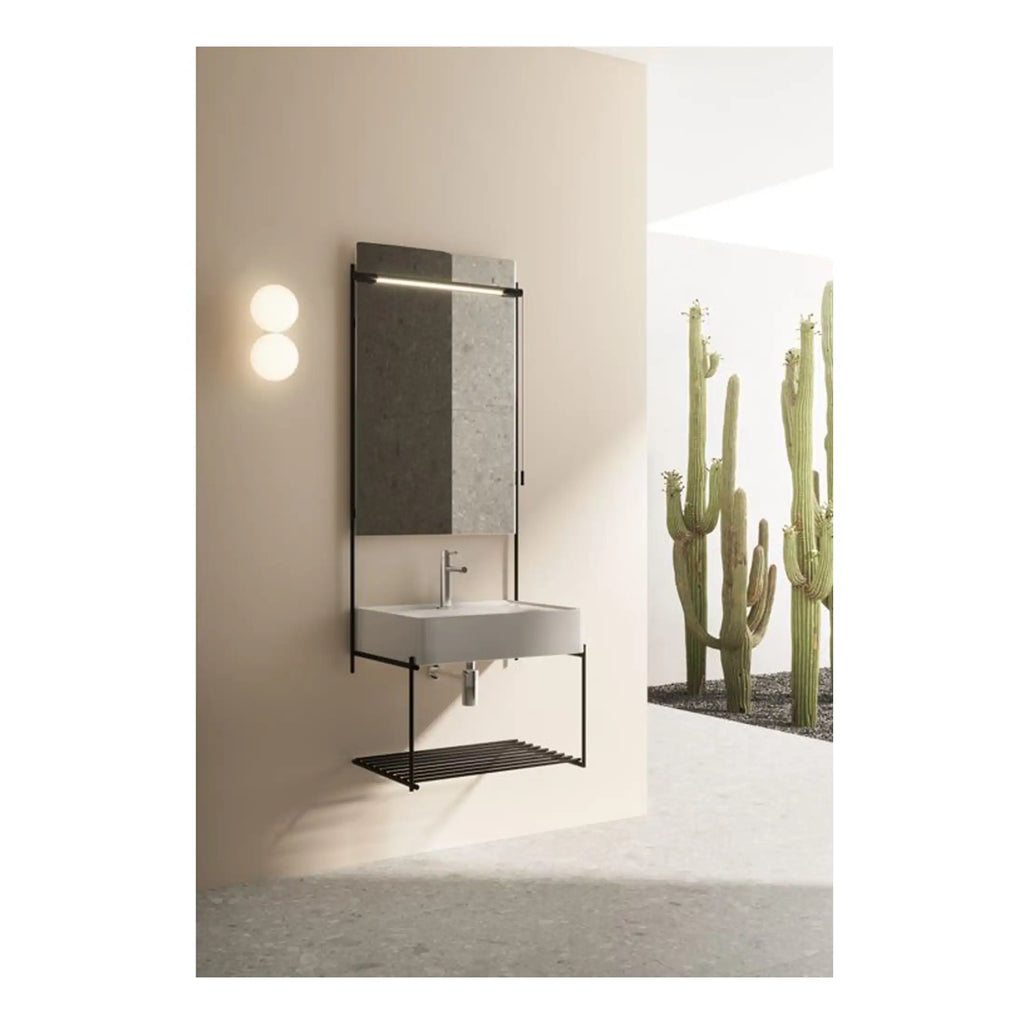 Sleek modern bathroom vanity with black metal frame, rectangular sink, and mirrored cabinet, set against a neutral wall with outdoor cactus decor, perfect for contemporary bathroom design.
