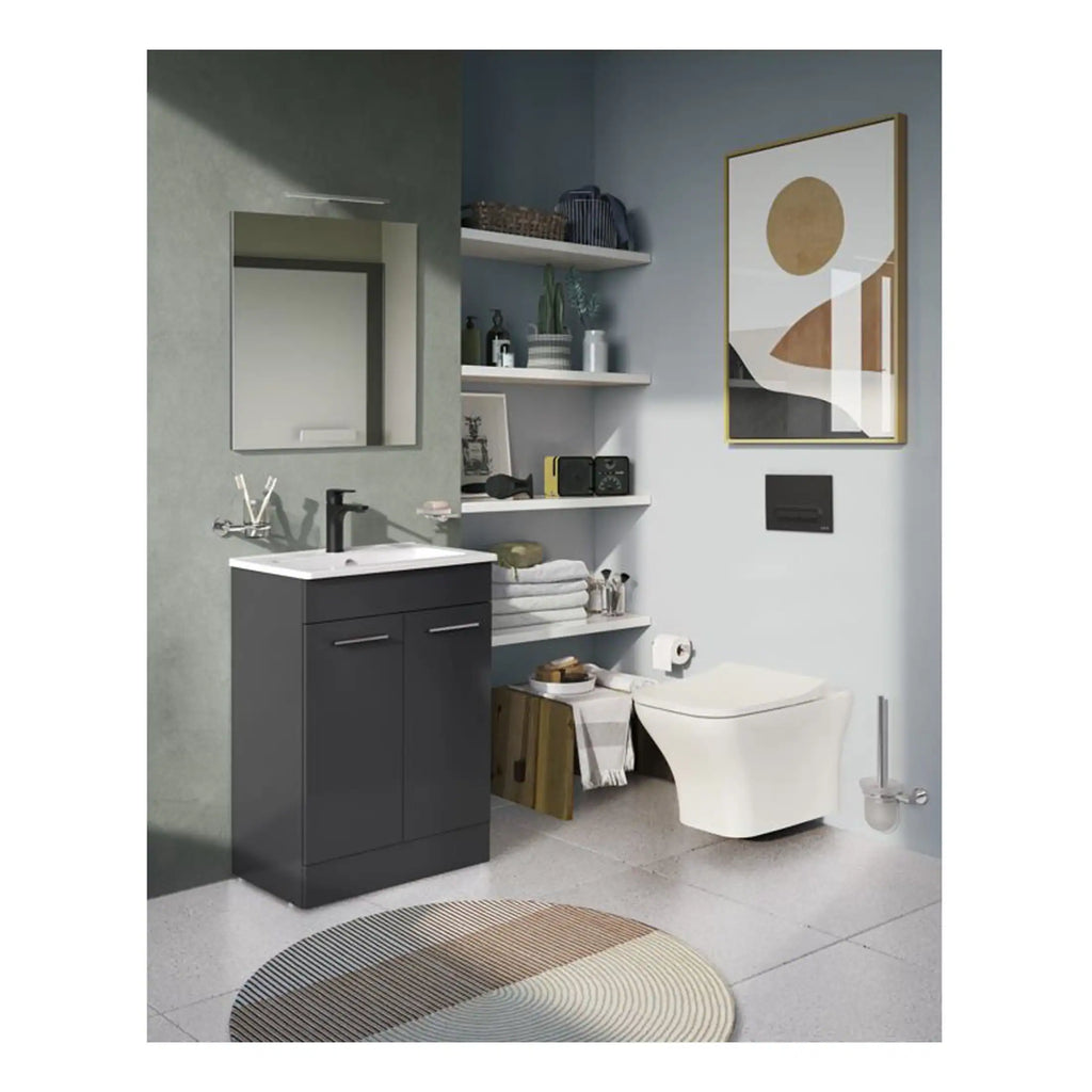 Modern bathroom with a sleek black vanity, wall-mounted toilet, minimalistic shelves, and contemporary wall art, creating a stylish and functional space.