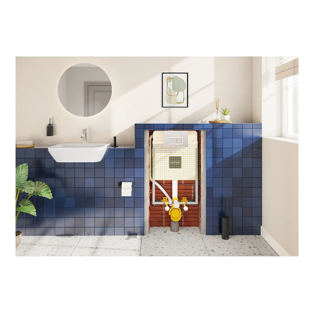 Drainage system installation in a modern bathroom with blue tiled walls and fixtures, showing seamless integration of plumbing and concealed cisterns for optimal space efficiency and aesthetic appeal.