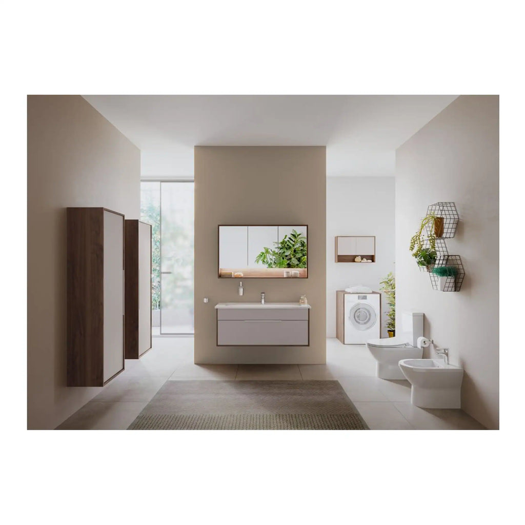 Modern minimalist bathroom design with neutral tones, wall-mounted sink, wall storage cabinets, and a laundry area featuring a washing machine. Bright, clean, and functional space.
