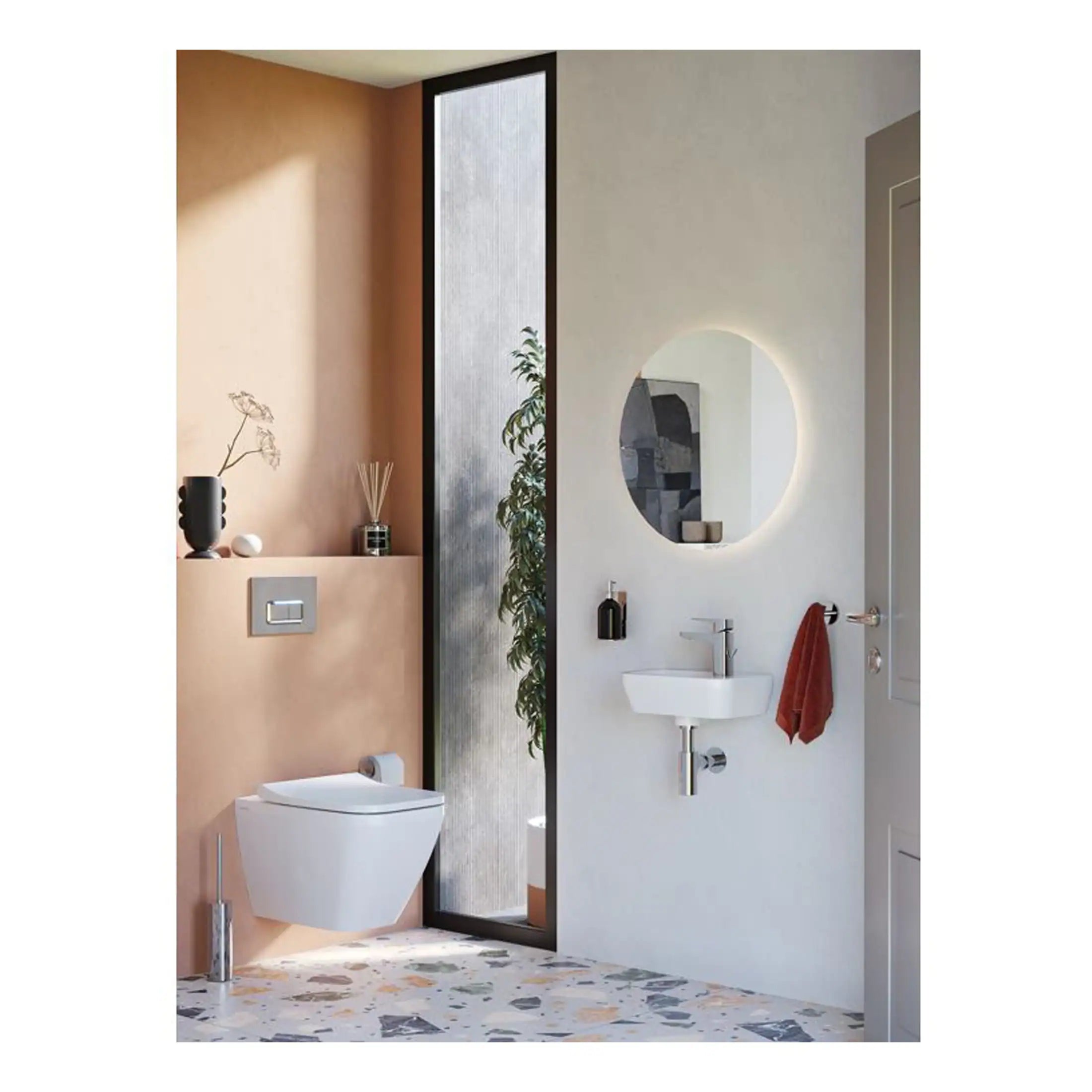Sleek modern bathroom with wall-mounted toilet, minimalist sink, circular illuminated mirror, and contemporary decor - perfect for stylish Bubly Bathrooms.