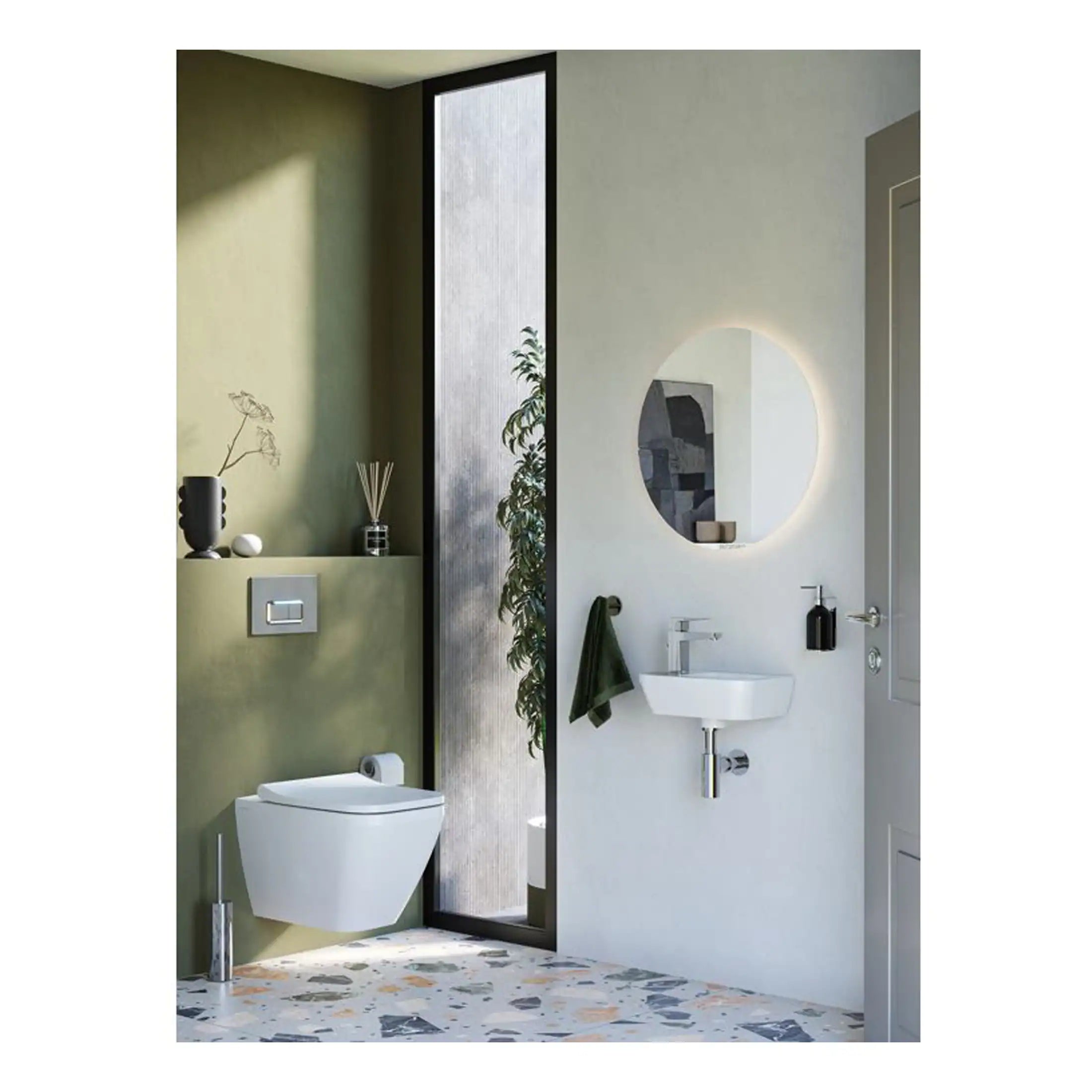 Contemporary bathroom featuring a wall-mounted toilet, minimalist sink with round mirror, and a stylish shower area with textured glass panel. Modern fixtures and natural decor create a sleek, functional space.
