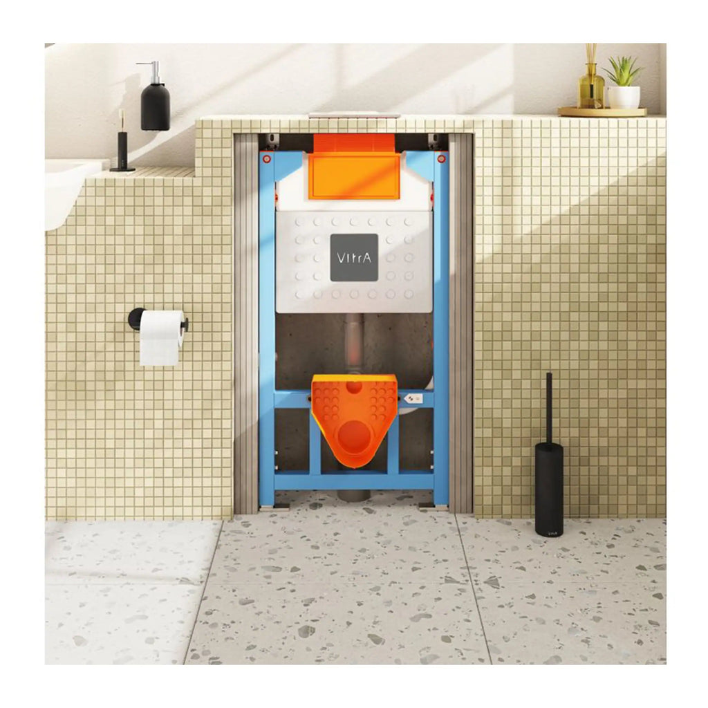 Adjustable wall-hung toilet frame with concealed cistern for modern bathroom installations, featuring VitrA technology and bright orange flush component. Ideal for customised bathroom refurbishment.