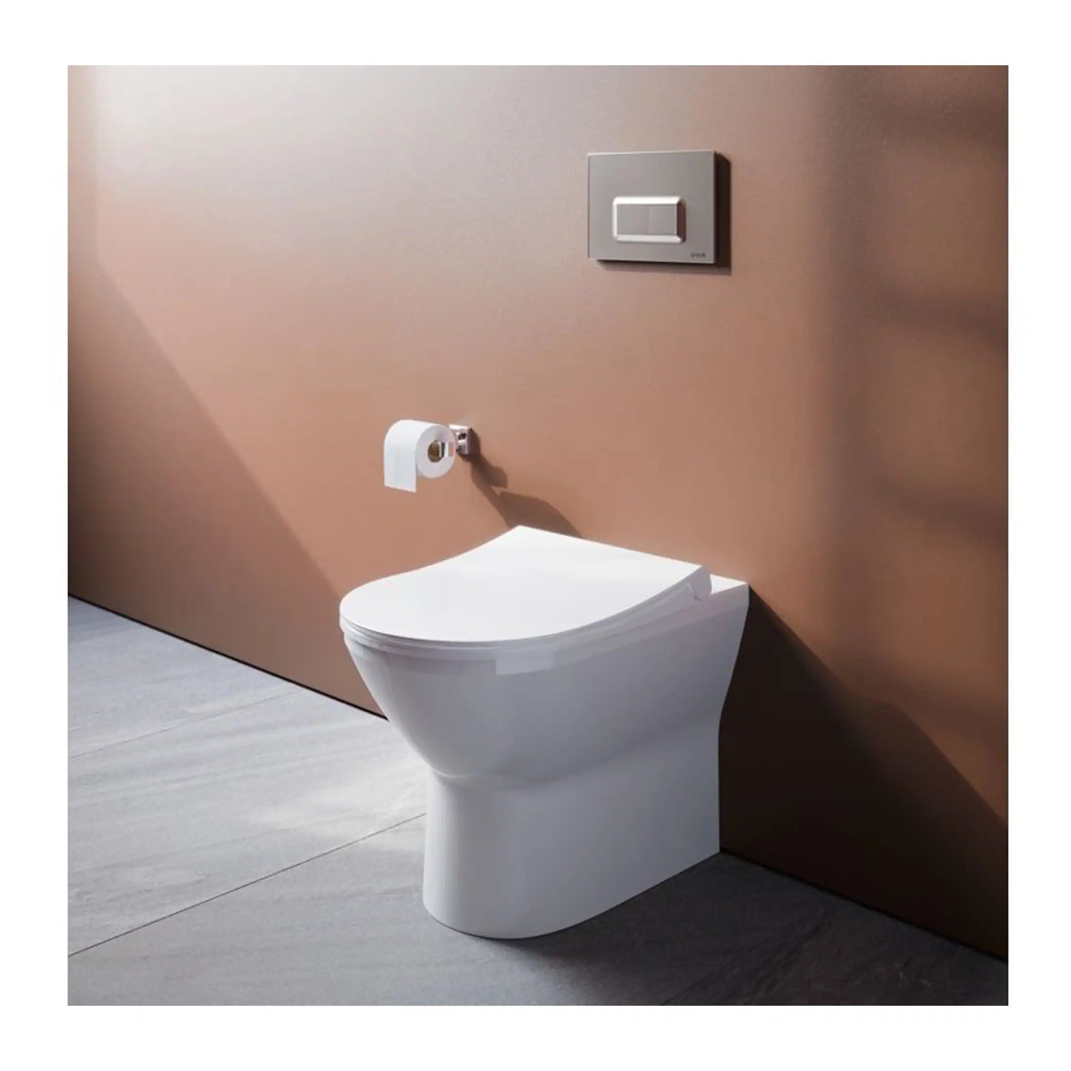 Contemporary wall-hung toilet with concealed cistern and minimalist flush plate, modern bathroom design emphasizes clean lines and sleek fixtures for a stylish, functional space.