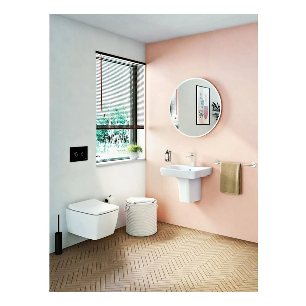 Modern bathroom with a white wall-hung toilet, stylish sink, round mirror, and natural light. Features minimalist design, soft colour palette, and elegant decor, perfect for contemporary Bubly bathroom interiors.