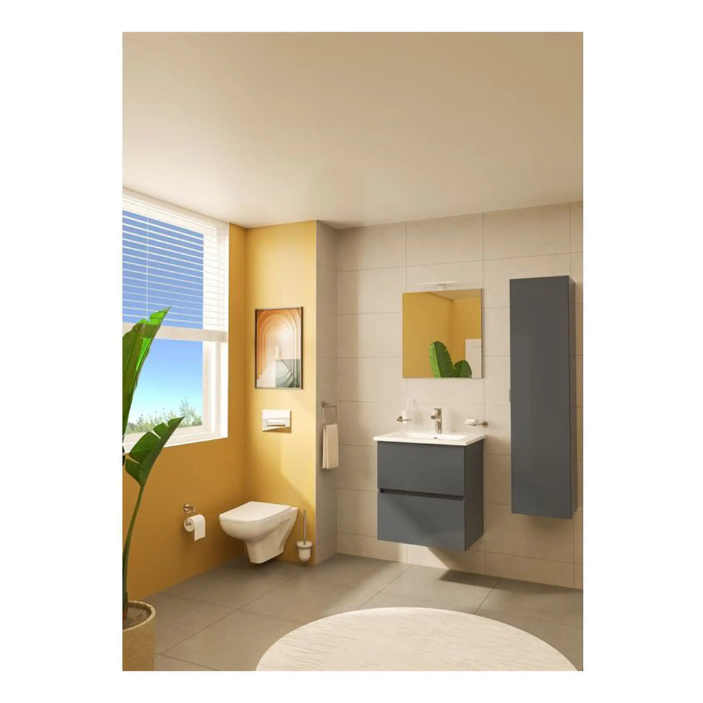 Modern bathroom with beige tiles, yellow accent wall, floating grey vanity with sink, wall-mounted toilet, large window with blinds, decorative framed art, and lush green plant, creating a contemporary and inviting atmosphere.