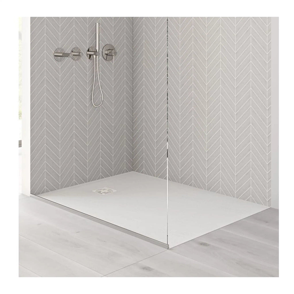 Modern walk-in shower with sleek angular grey patterned tiles and minimalist chrome fixtures for stylish bathroom renovations.