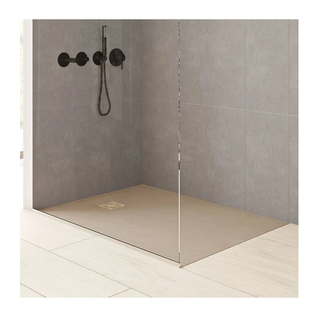 Modern walk-in shower with grey tile walls and black fixtures, including a handheld showerhead and wall-mounted controls, in a sleek and minimalist bathroom setup.