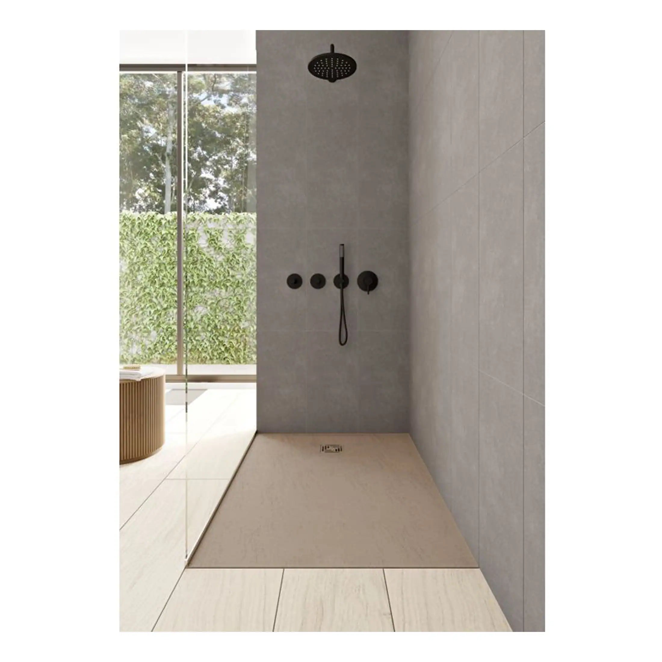 Dark matte black shower fixtures, rainfall showerhead, wall-mounted controls, modern grey tiled shower area with glass partition, minimalist design, natural light from large window, contemporary bathroom decor.