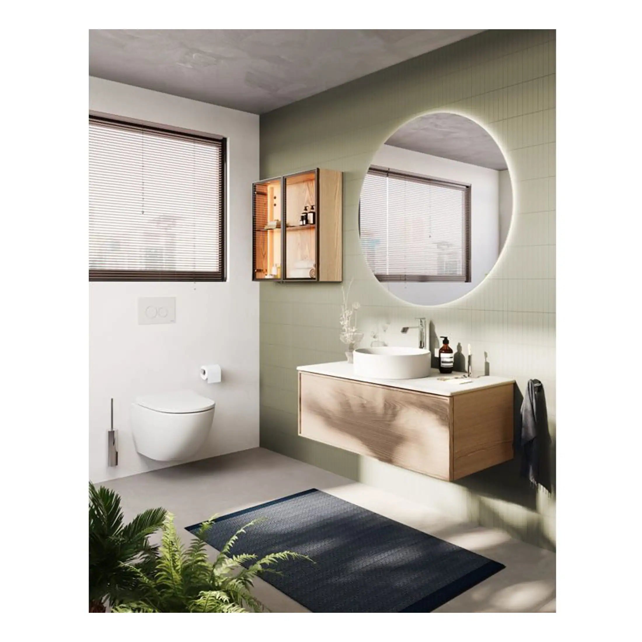 Sleek modern bathroom with wall-mounted vanity, round vessel sink, large illuminated mirror, and natural light from windows, showcasing contemporary bathroom design.