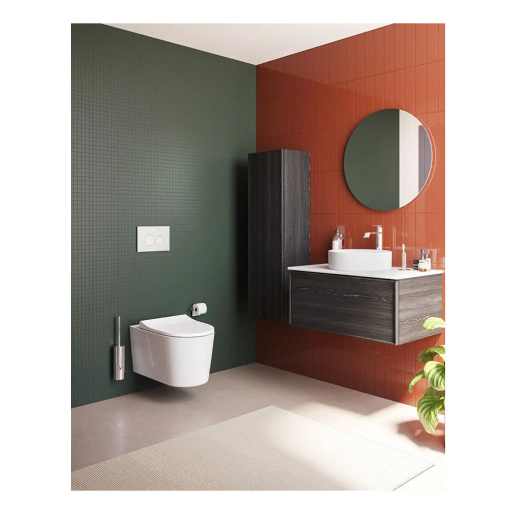 Contemporary bathroom featuring green and terracotta tiled walls, modern wall-mounted toilet, round mirror, wooden vanity with vessel sink, and minimalist accessories, designed by Bubly Bathrooms.
