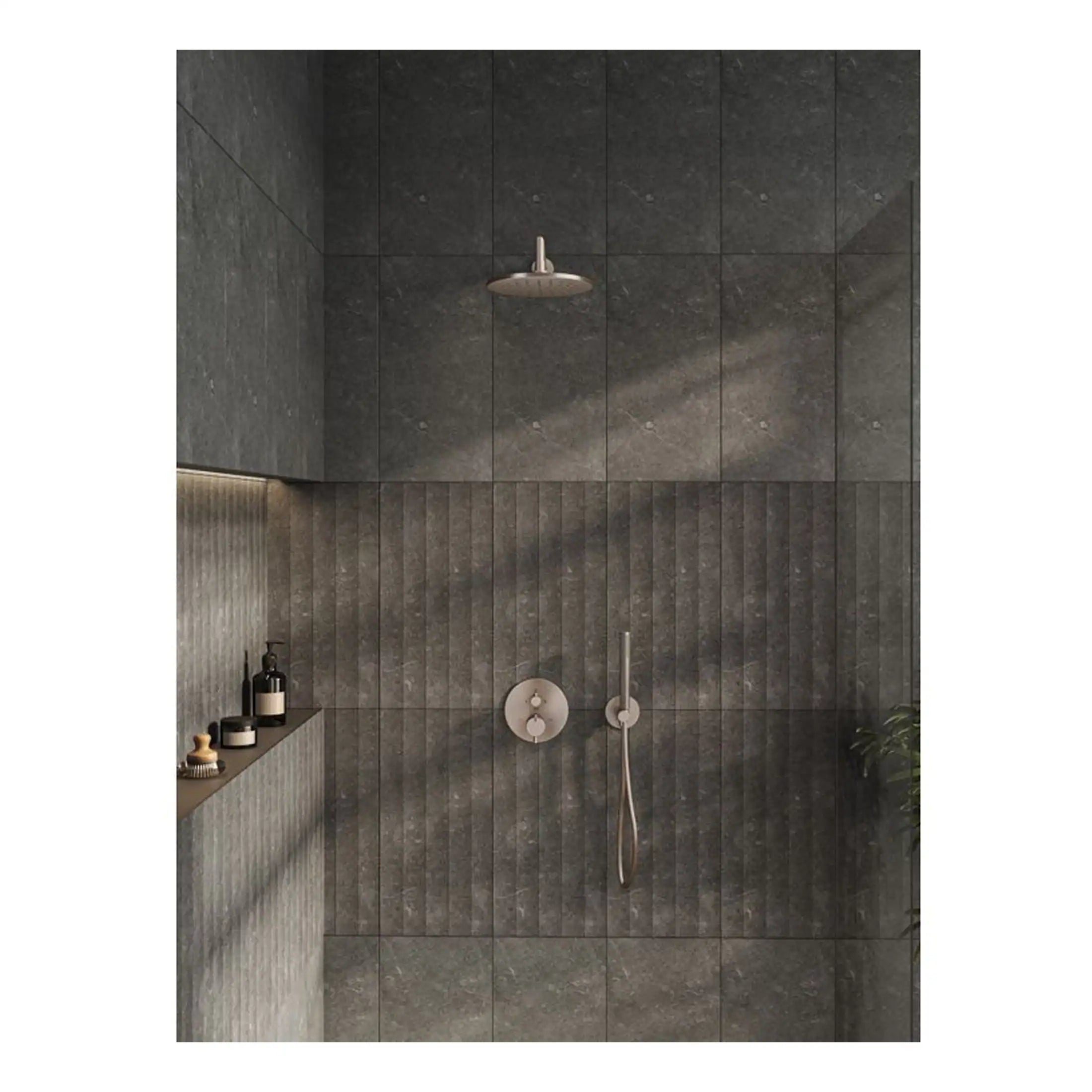 Sleek modern shower area with dark grey textured tiles, rainfall showerhead, and minimalist fixtures, ideal for contemporary bathroom designs.