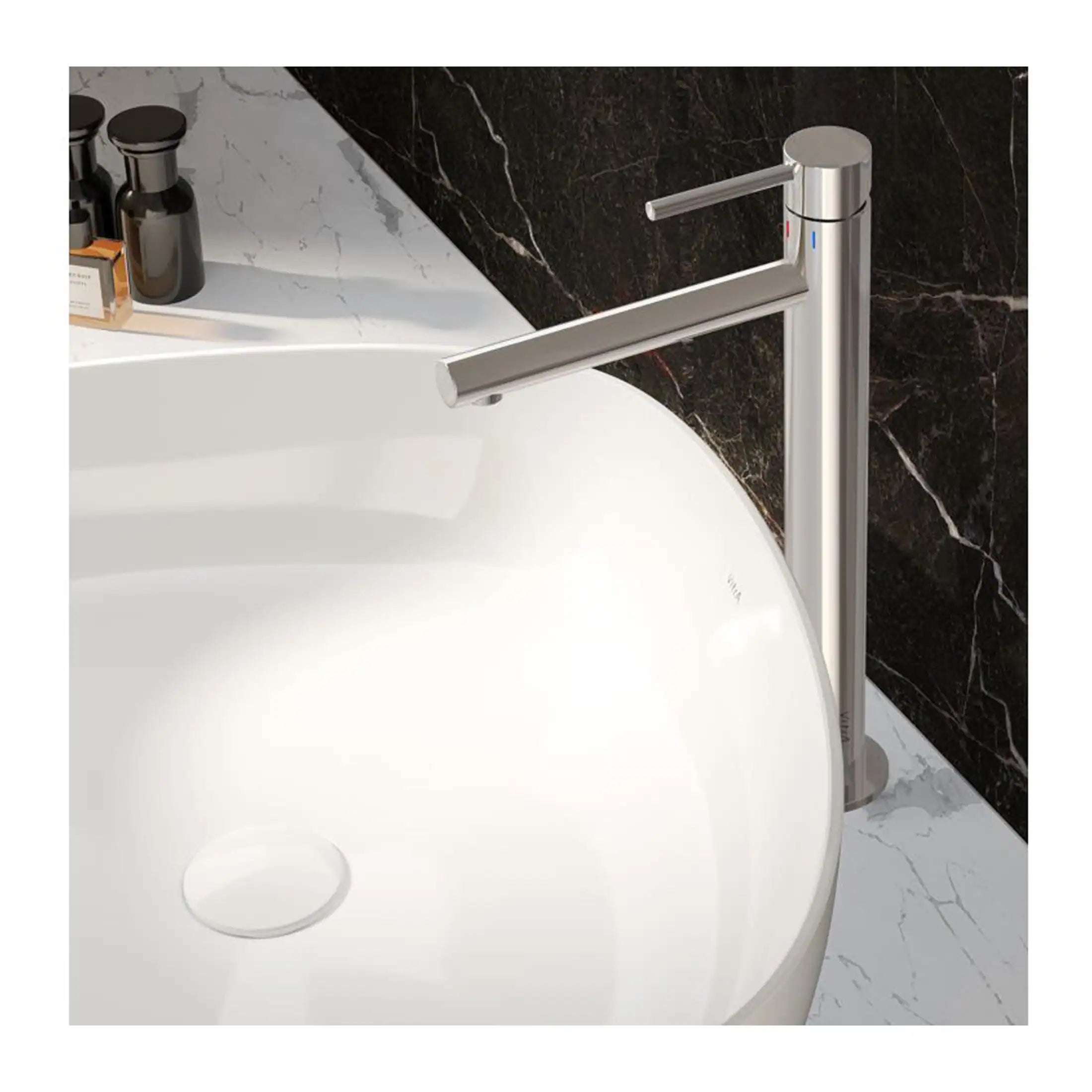 Sleek silver bathroom tap mounted on a white vessel sink with marble countertops and black marble wall accents. Perfect for modern Bubly bathrooms featuring contemporary fixtures and stylish design.
