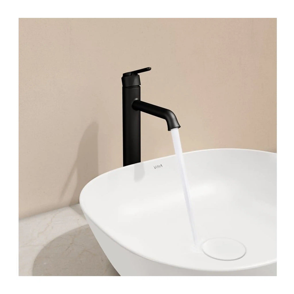 Modern black bathroom mixer tap with flowing water over a white vessel sink, showcasing stylish bathroom fixtures and contemporary design.