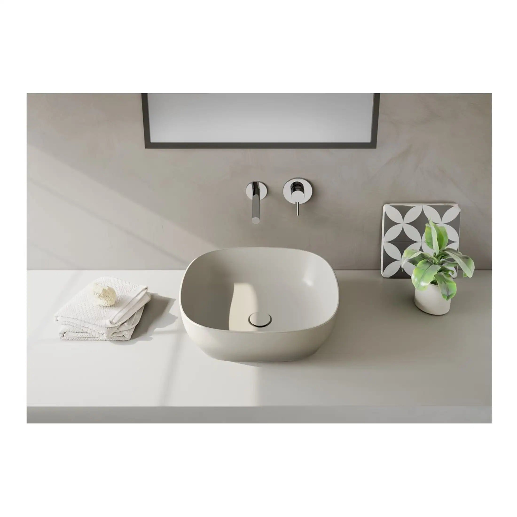 Sleek modern bathroom sink with minimalist design, featuring a wall-mounted faucet, neutral tones, and stylish decorative elements including a potted plant and patterned tiles for contemporary bathroom decor.
