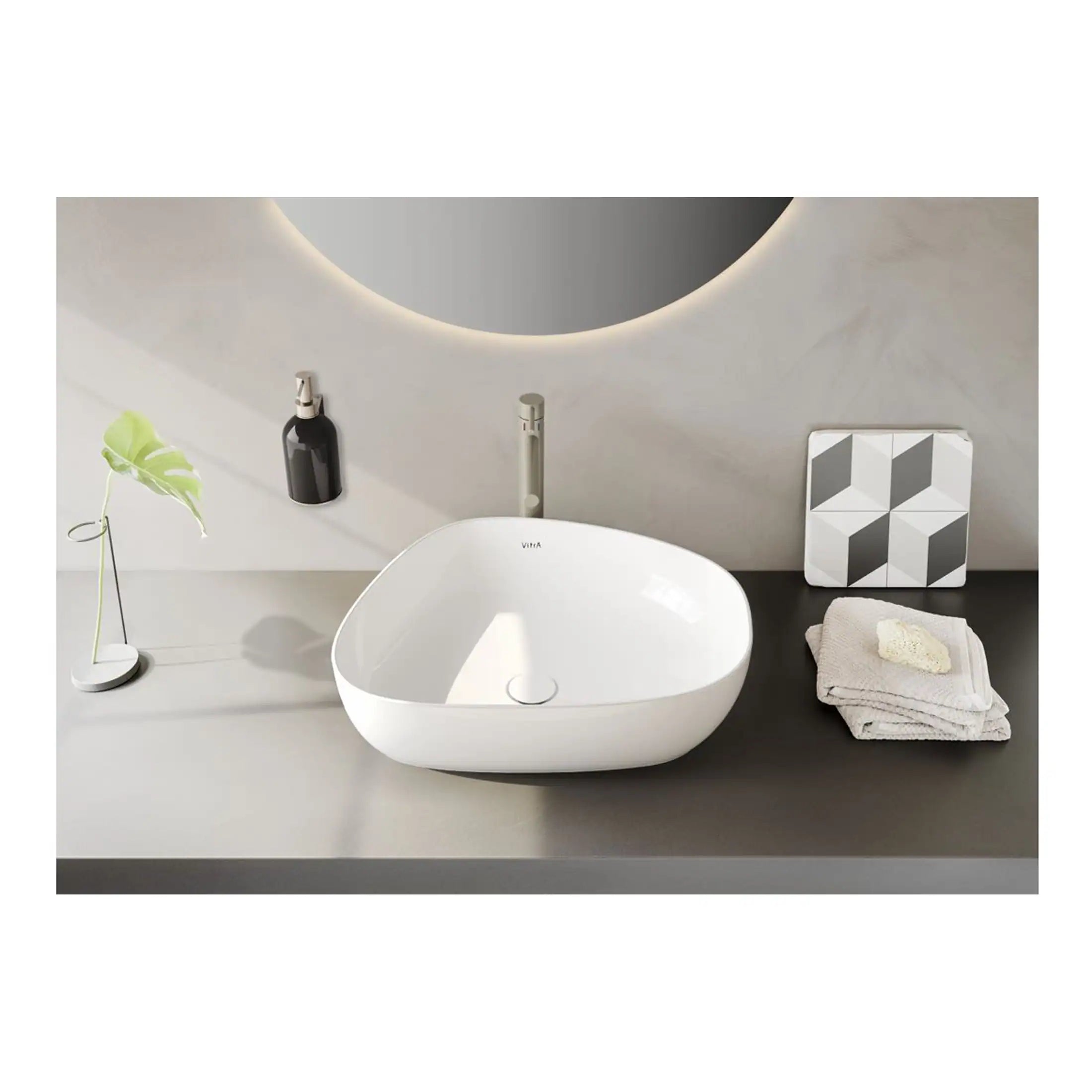 Sleek white bathroom vanity sink with modern design, positioned on a minimalist grey surface with decorative accents, ideal for contemporary bathroom interiors with premium fittings.