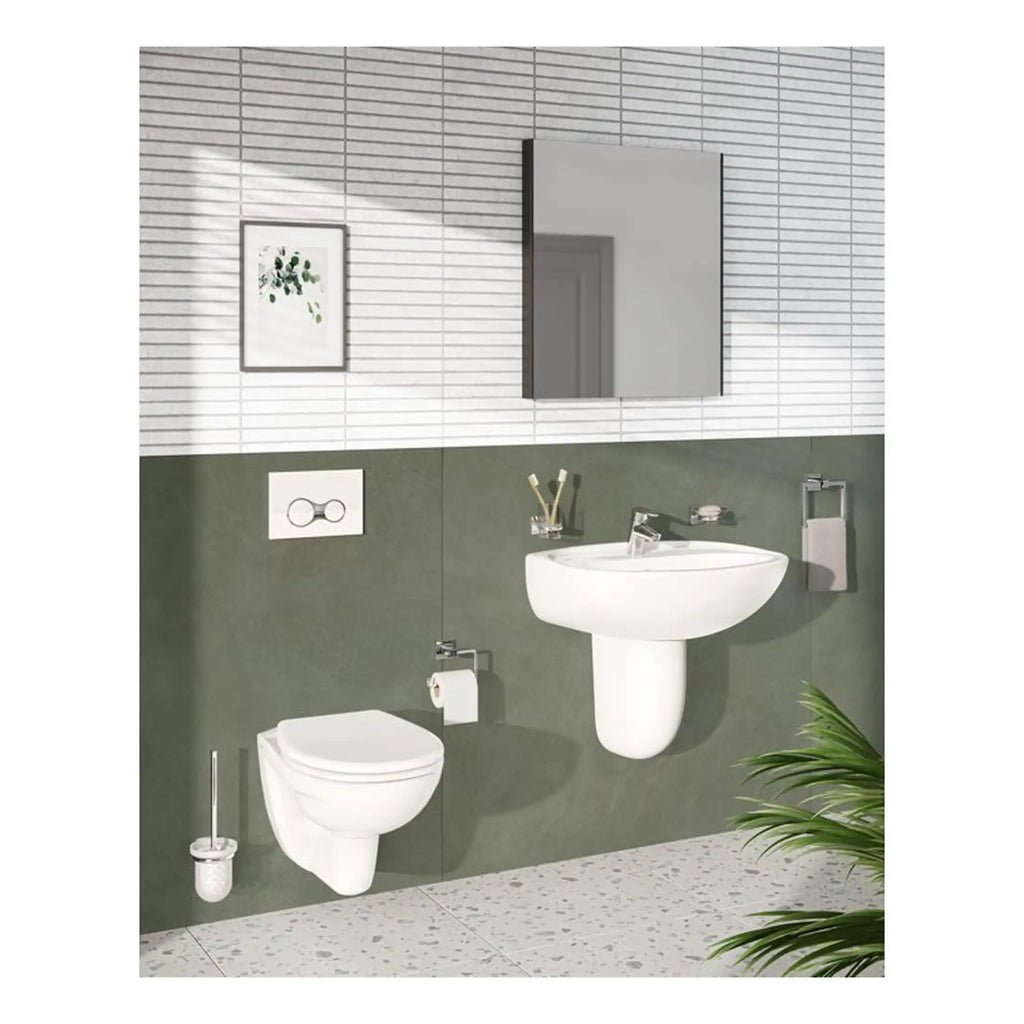 Contemporary bathroom with white wall-mounted toilet and sink, large mirror, and modern accessories, featuring a sleek, minimalist design perfect for stylish bathrooms.