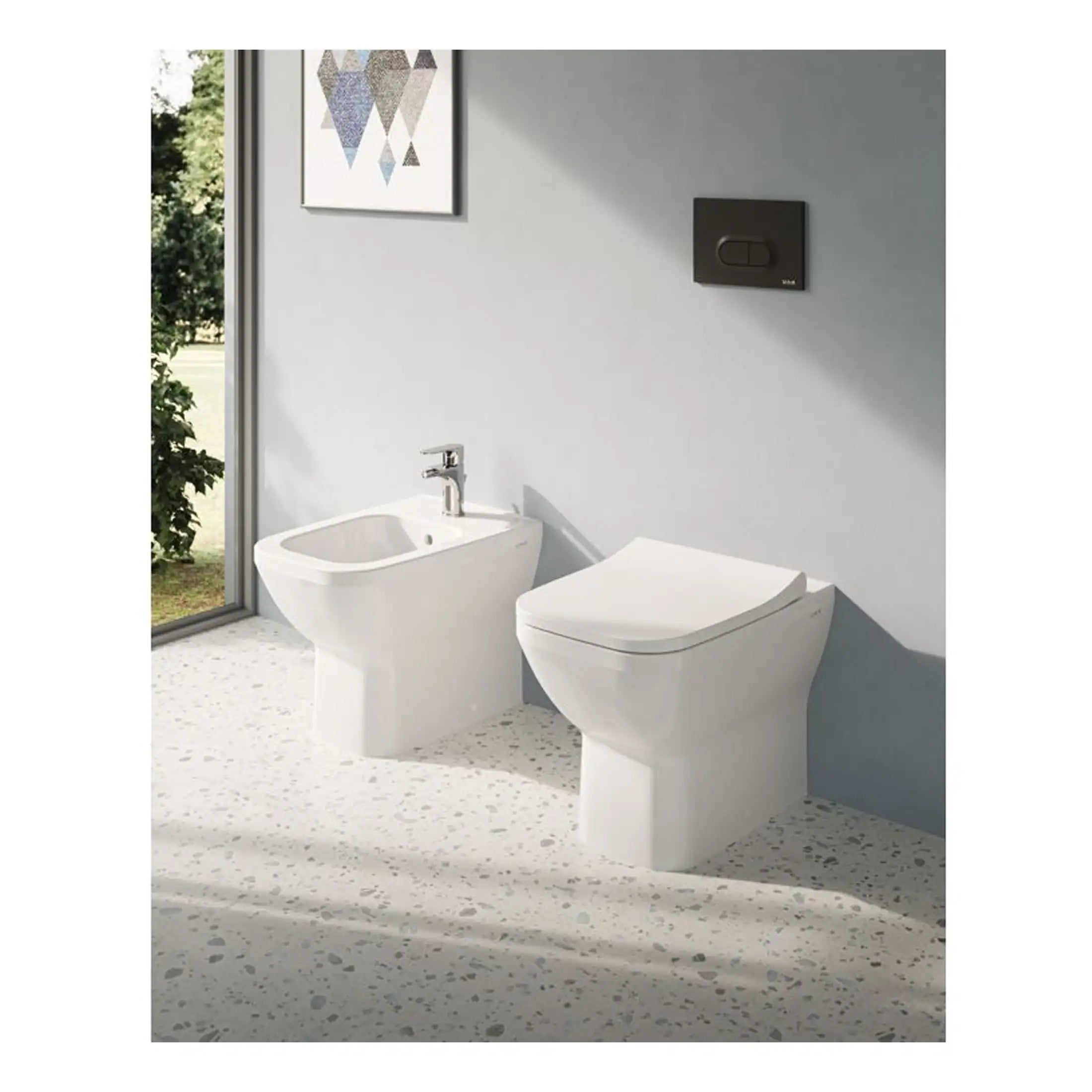 Toilet and bidet set from Bubly Bathrooms, modern white ceramic fixtures with sleek design, ideal for contemporary bathrooms, featuring efficient flushing and comfort.