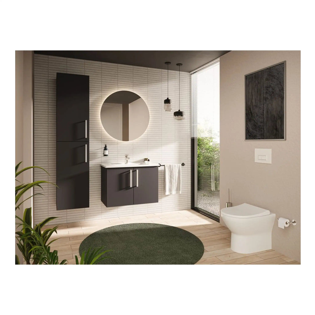 Modern minimalist bathroom with black cabinetry, round mirror, and white tiled walls, featuring a sleek toilet and natural light from large windows, creating a contemporary, stylish space.