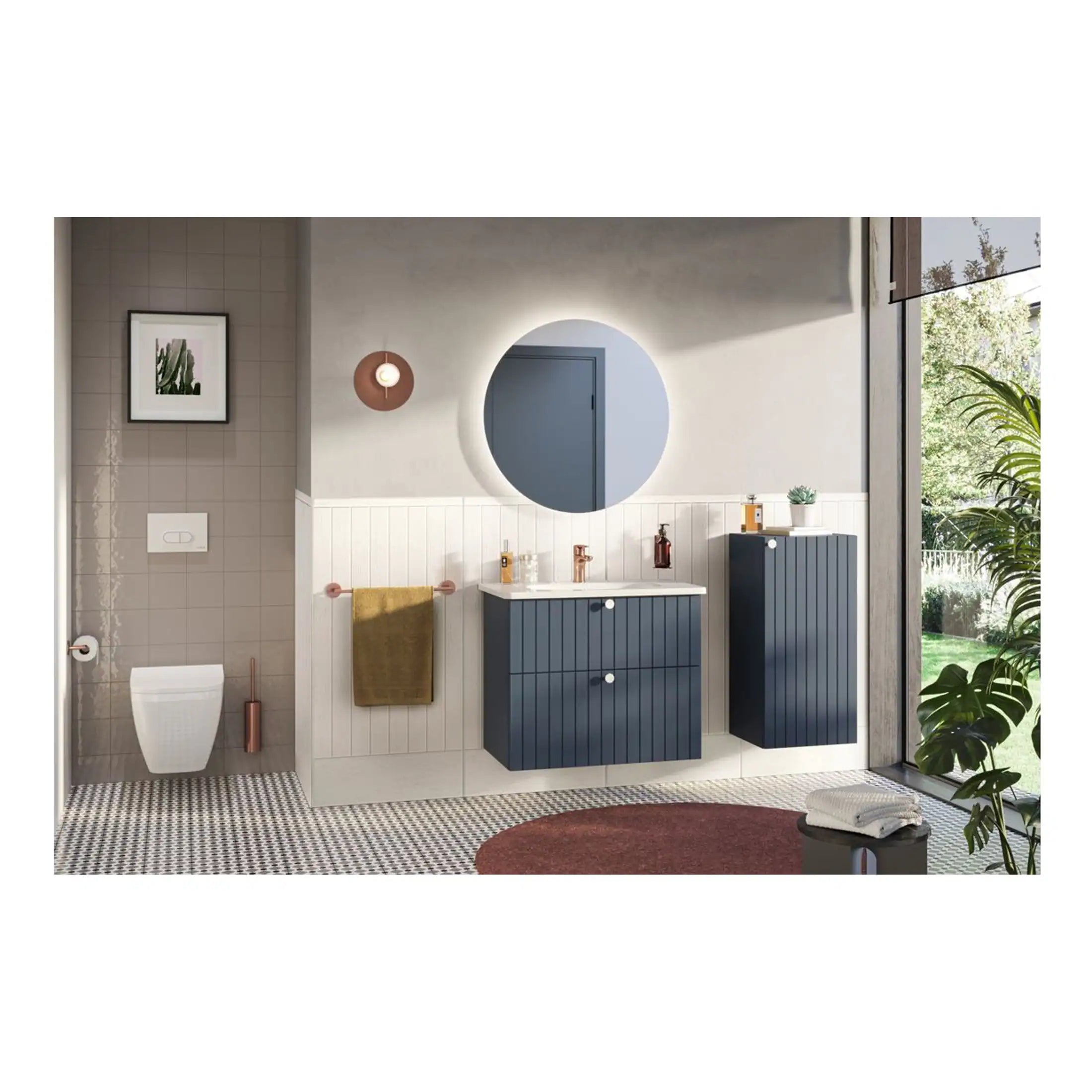 Sleek modern bathroom with navy blue cabinetry, round illuminated mirror, and stylish accessories, showcasing contemporary bathroom design and vanity units from Bubly Bathrooms.