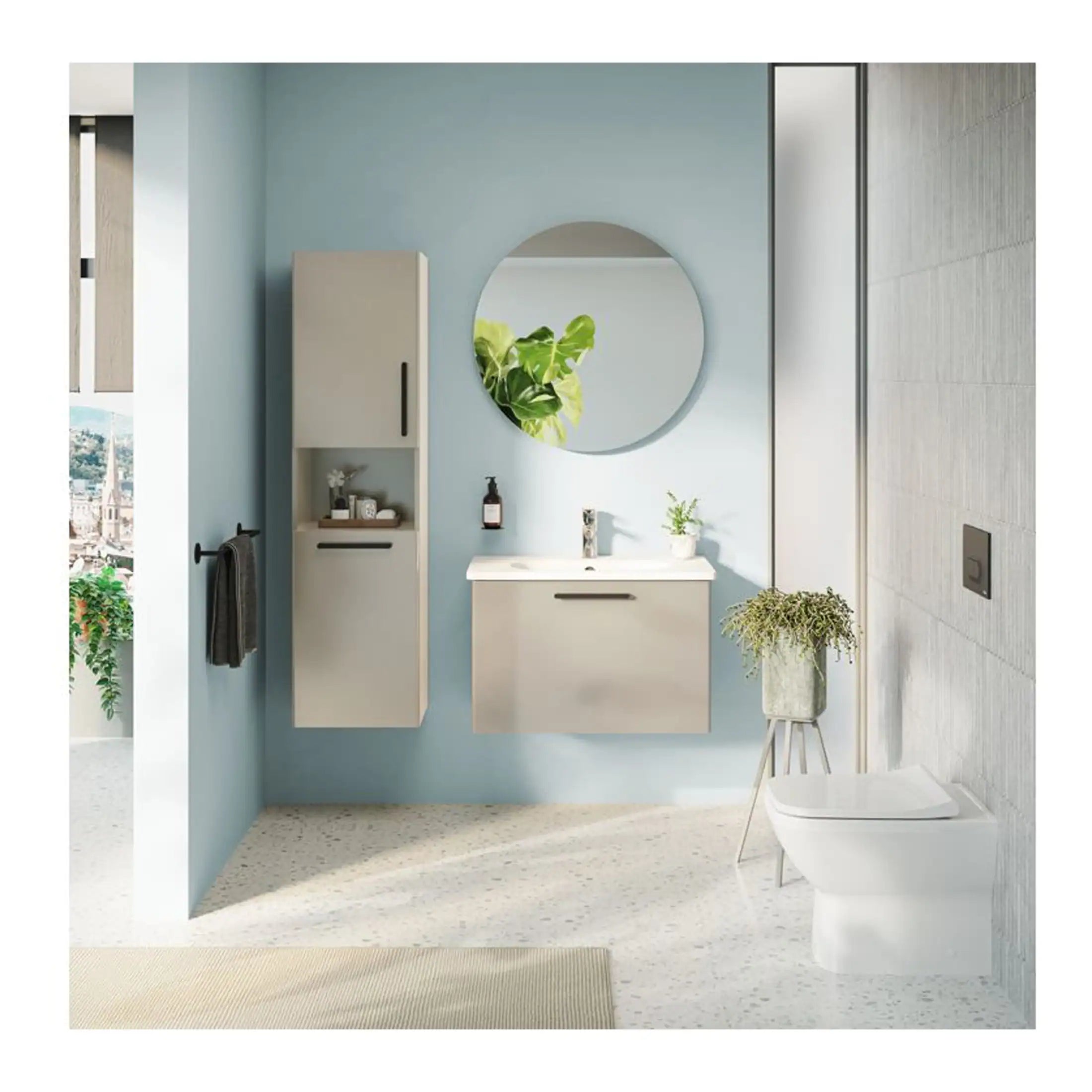 Modern minimalist bathroom with floating vanity, wall-mounted toilet, circular mirror, and natural plants, showcasing contemporary Bubbly Bathrooms design in a bright, airy space.