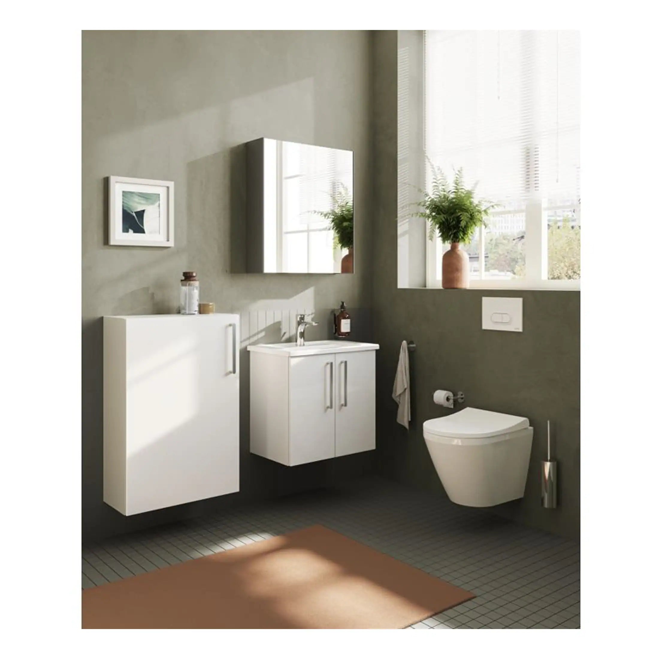 Modern white bathroom furniture with wall-mounted vanity, floating toilet, large mirror, and decorative plants, ideal for contemporary bathroom design and space-saving solutions.