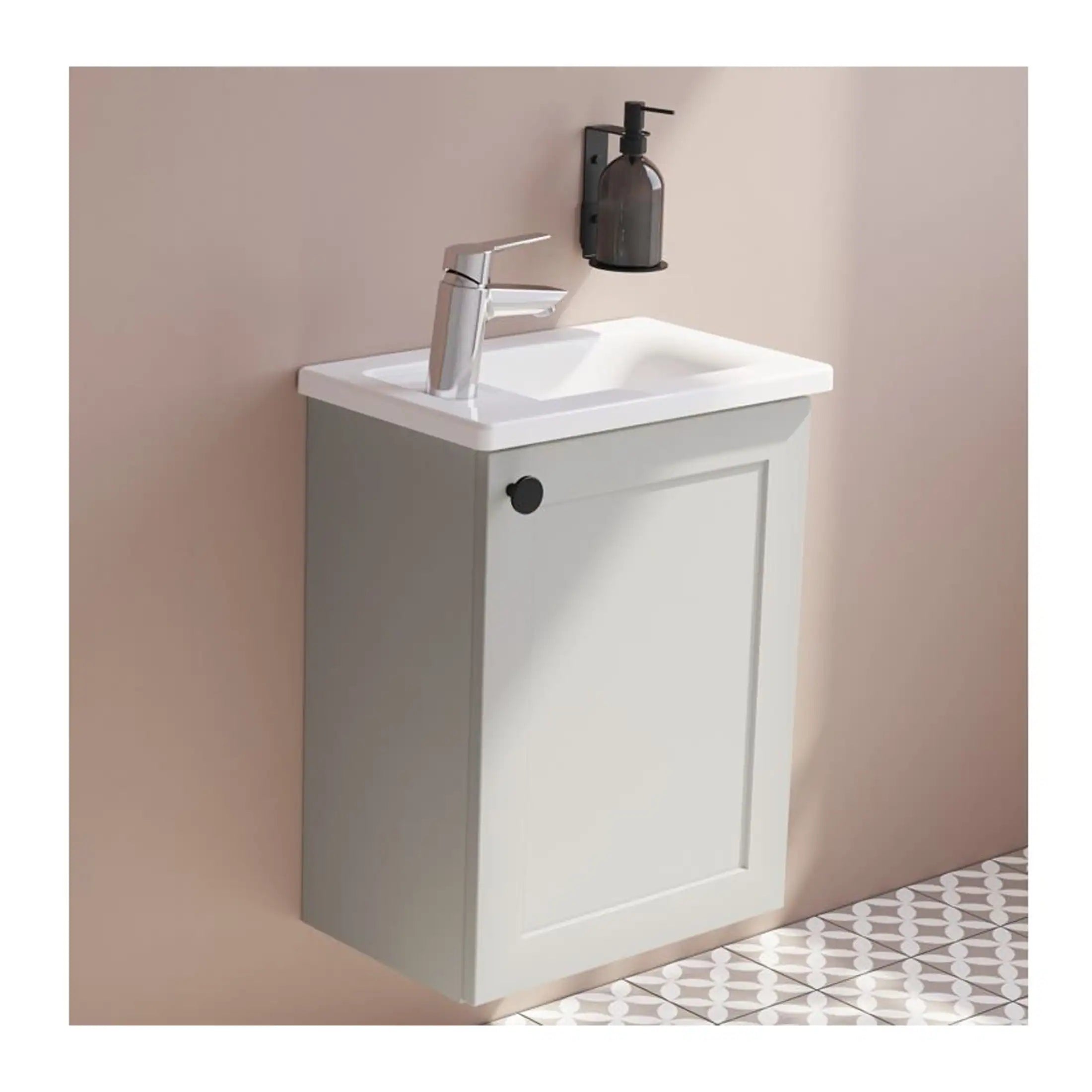 Modern bathroom vanity with a sleek white sink, chrome faucet, and a wall-mounted soap dispenser, set against a neutral wall for a minimalist bathroom decor.