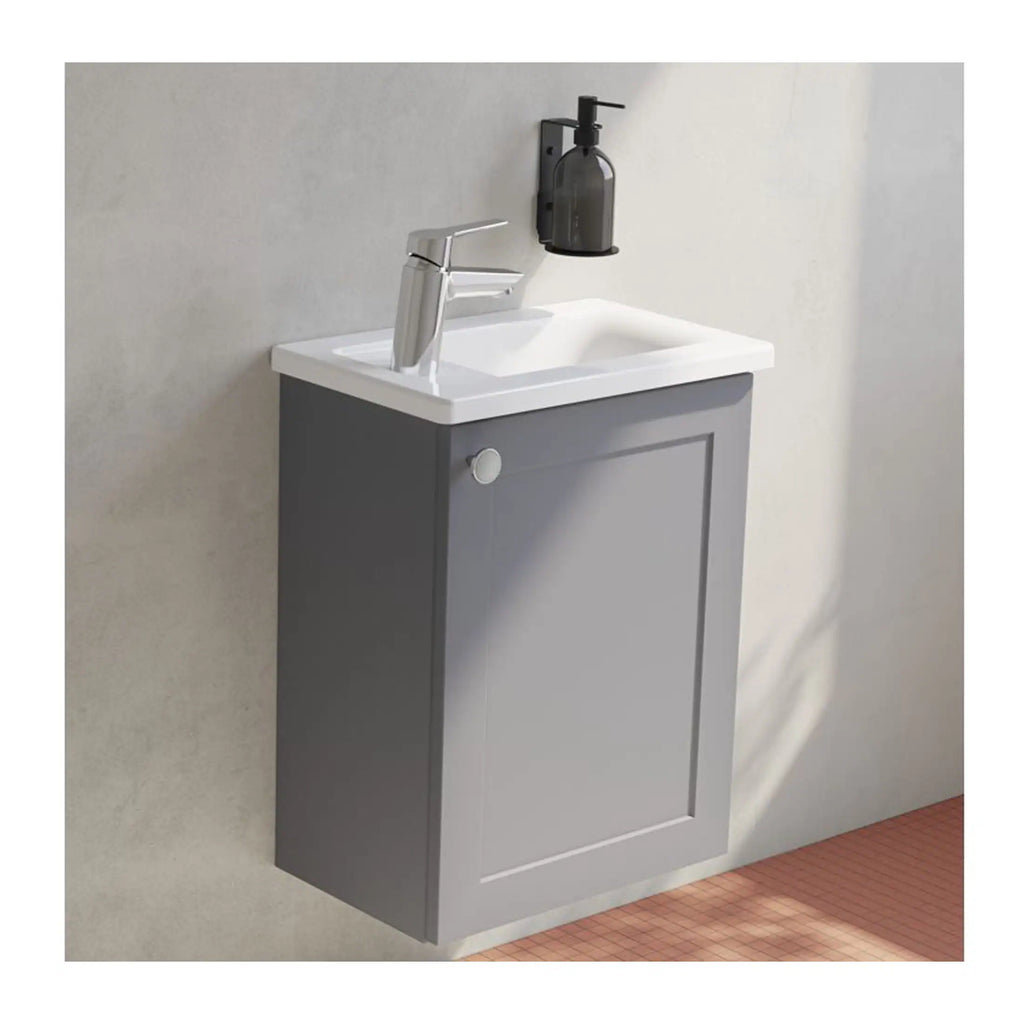 Modern grey bathroom vanity unit with integrated sink, chrome tap, wall-mounted soap dispenser, ideal for contemporary bathroom decor.