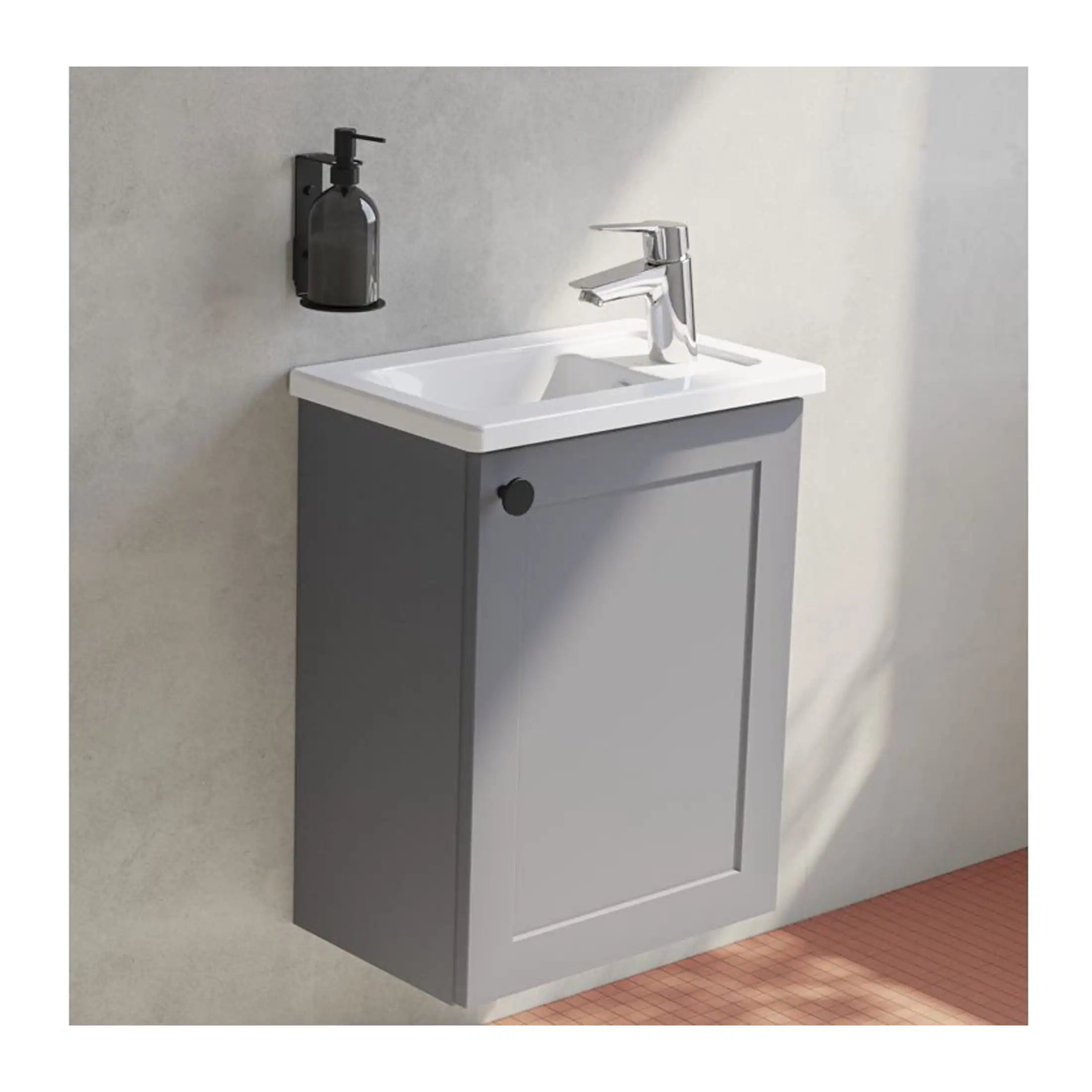Sleek grey bathroom vanity with integrated sink and modern chrome faucet, ideal for contemporary bathroom designs. Includes wall-mounted soap dispenser for convenience. Perfect for compact bathroom spaces.