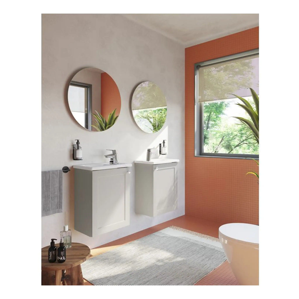 Modern bathroom with double vanities, round mirrors, grey cabinetry, large window with roller blind, and contemporary decor, ideal for stylish Bubly Bathrooms.