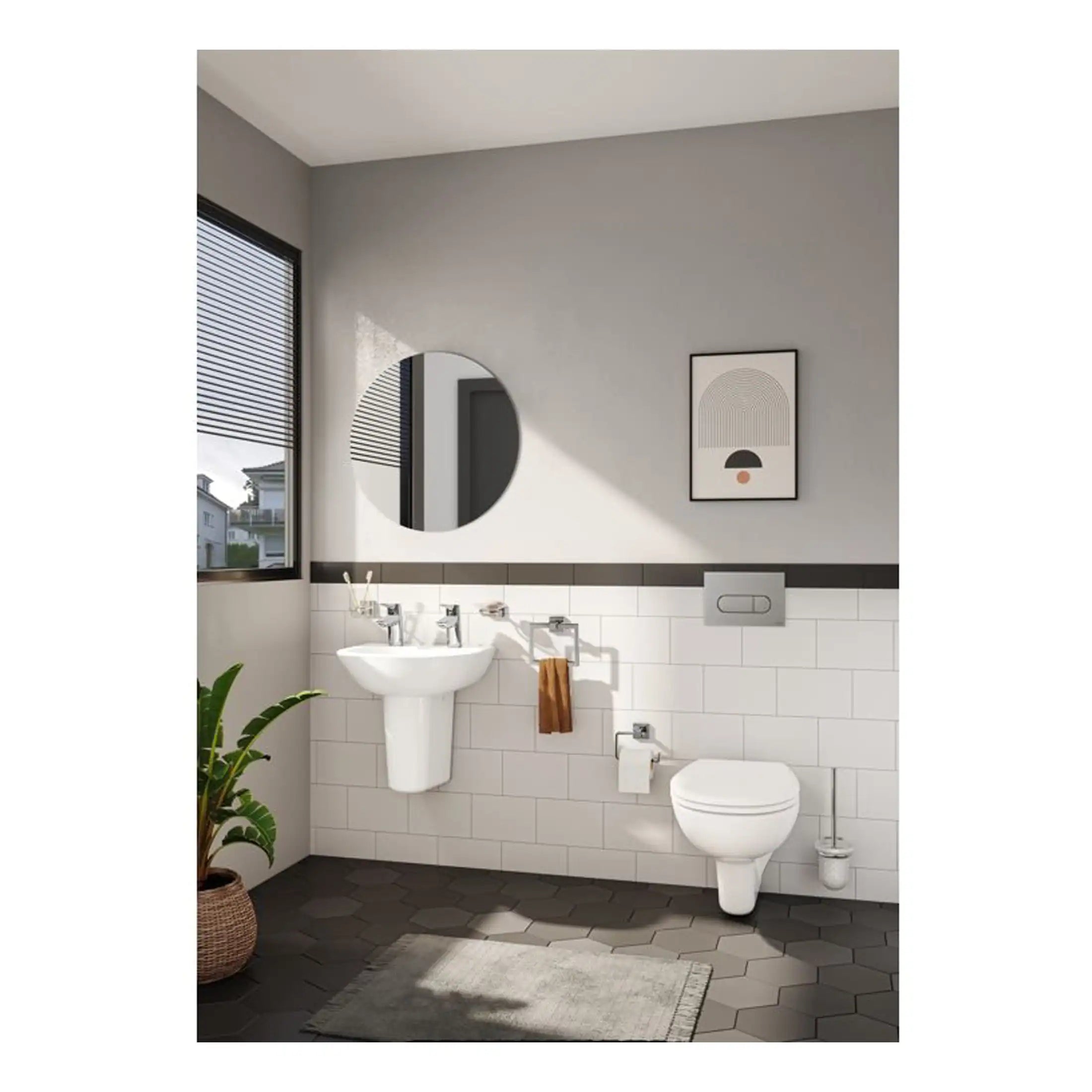 Modern minimalist bathroom with white fixtures, wall-mounted toilet, round mirror, black and white decor, and natural light for sleek bathroom design.