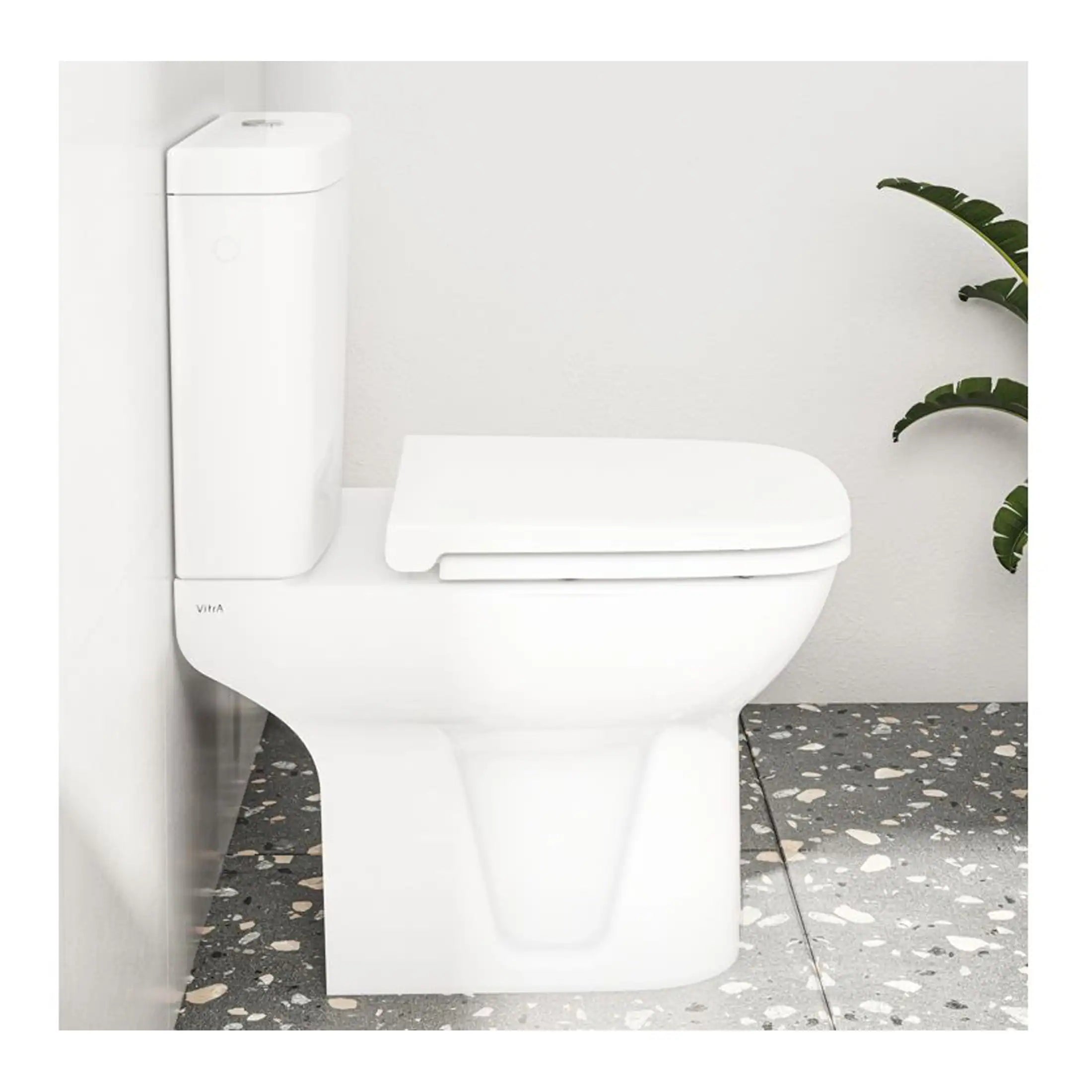 Modern white toilet with dual-flush mechanism and sleek design, perfect for contemporary bathrooms. Features water-saving technology and easy-to-clean surface, ideal for stylish and eco-friendly bathroom spaces.