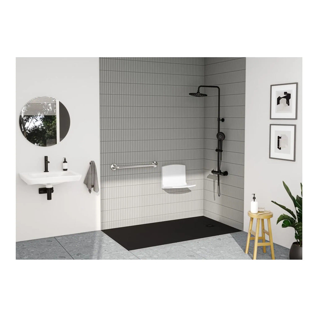 Clean modern accessible shower room with walk-in shower, black fixtures, and minimalist decor in a contemporary bathroom design. Perfect for stylish, functional bathroom renovations.
