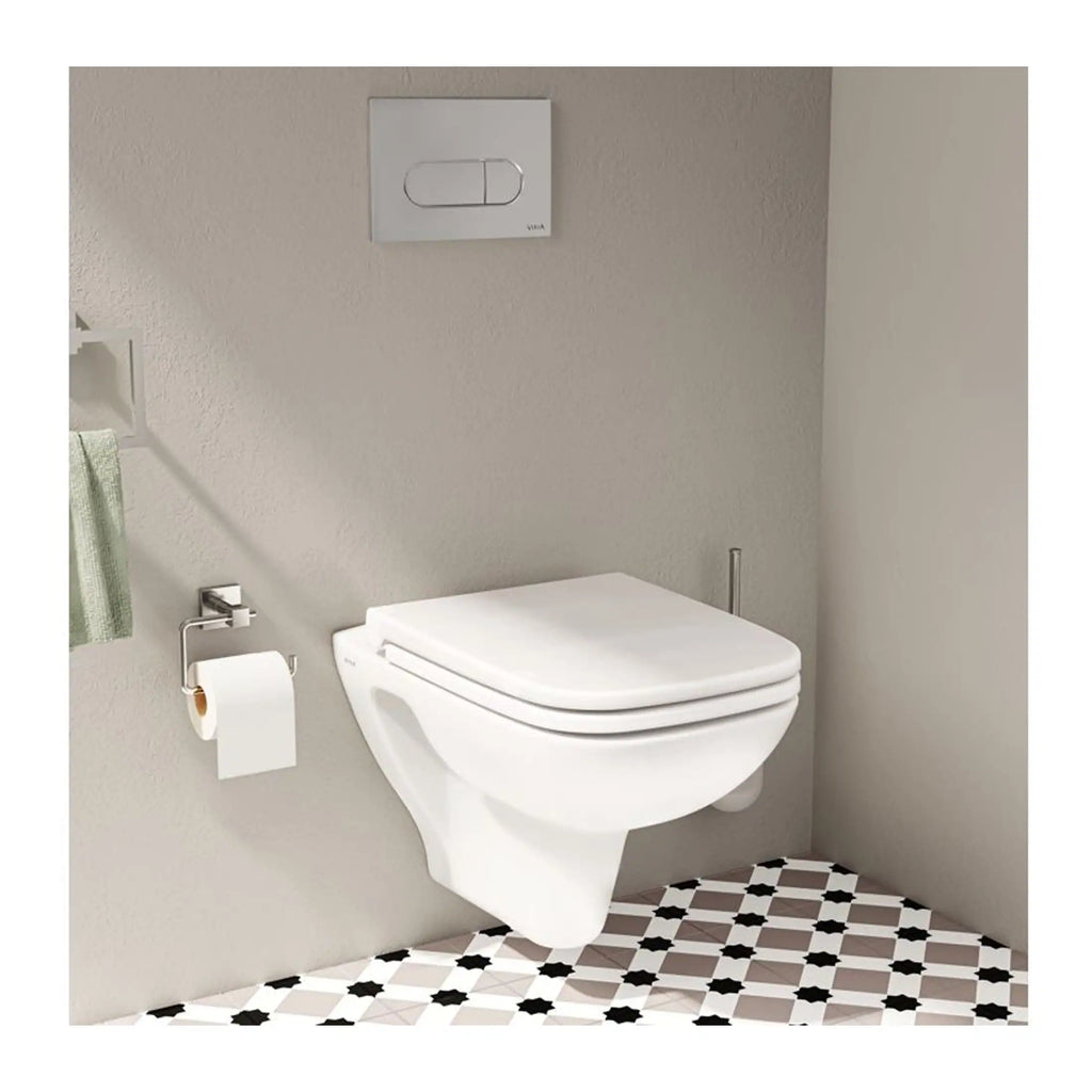 Sleek modern wall-mounted toilet with dual-flush system, set against a neutral bathroom wall with patterned floor tiles, highlighting contemporary British bathroom design.