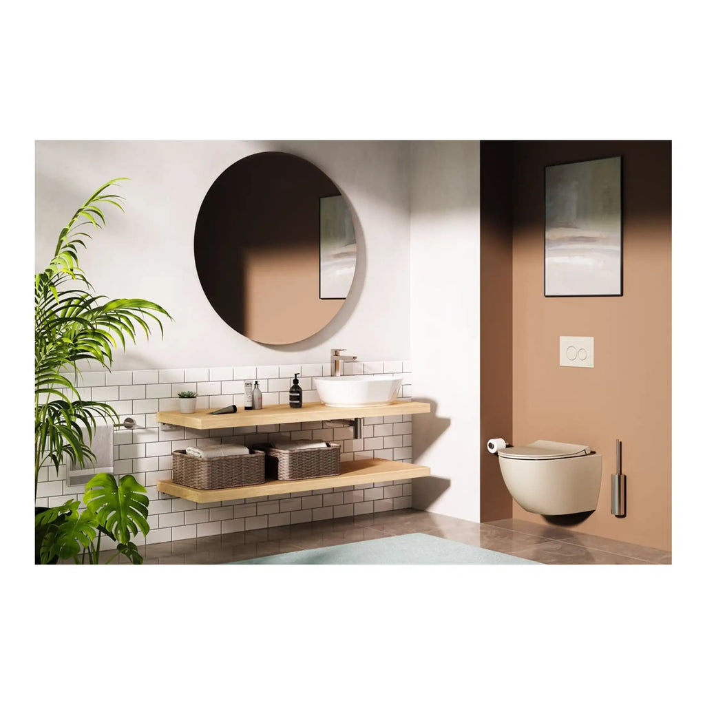 Contemporary bathroom featuring a wall-mounted toilet, sleek ceramics, modern round mirror, floating wooden vanity with basin, stylish accessories, and natural decor, designed for aesthetics and functionality.