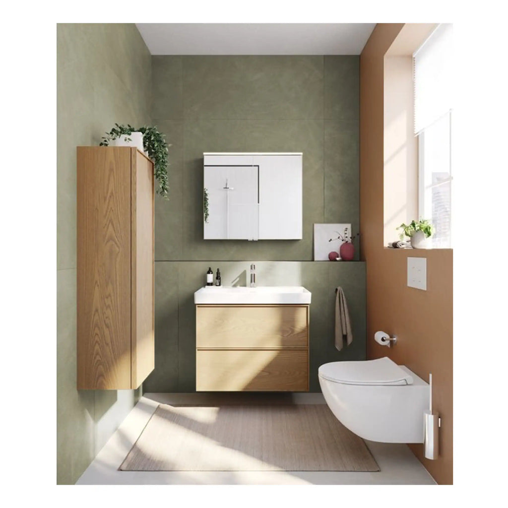 Contemporary bathroom with minimalist wooden vanity, wall-mounted toilet, and storage cabinet. Natural light enhances the space’s modern design and earthy colour palette. Perfect for a sleek, functional bathroom upgrade.